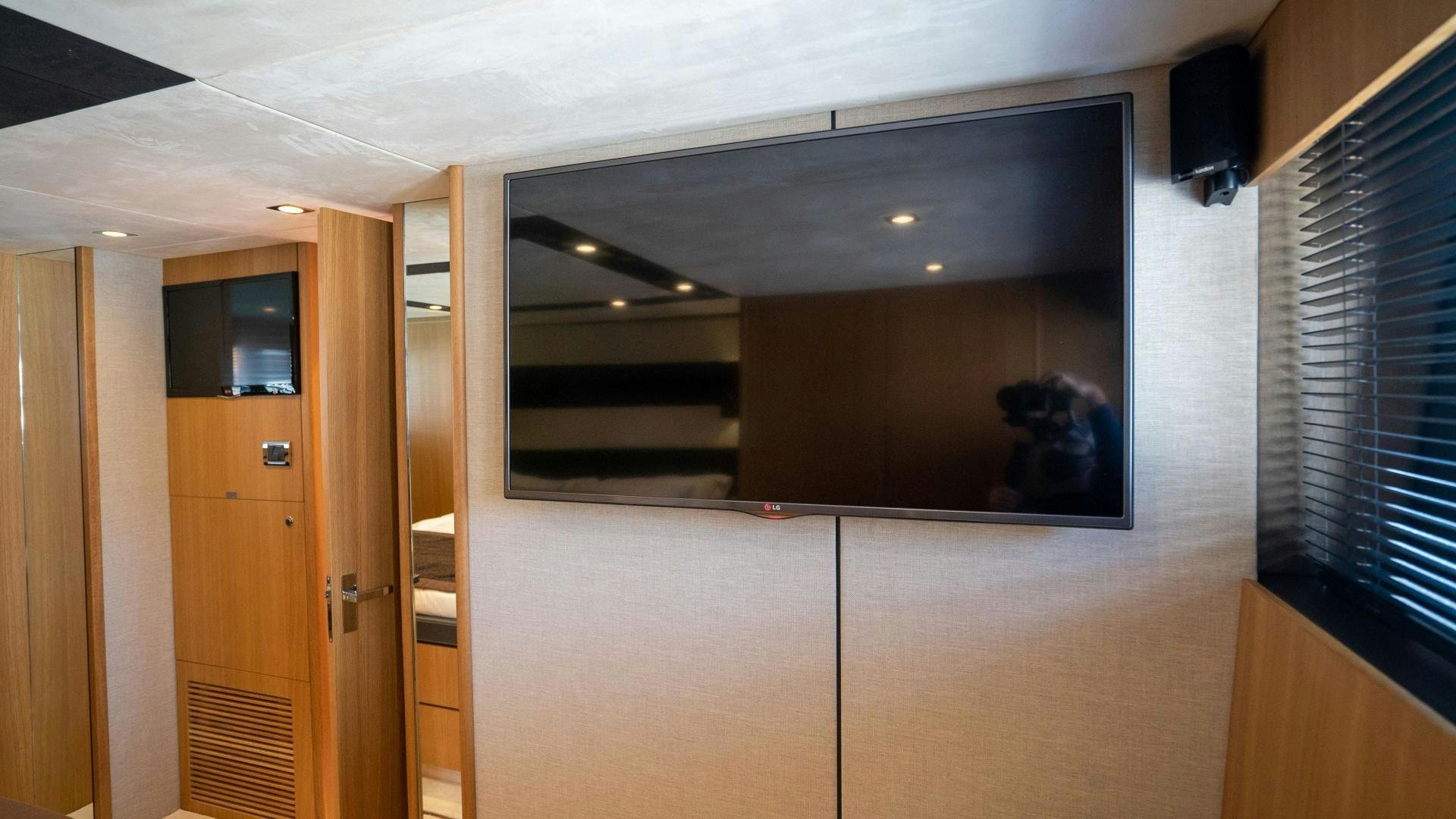 a person in a room aboard OCHO UNO Yacht for Sale