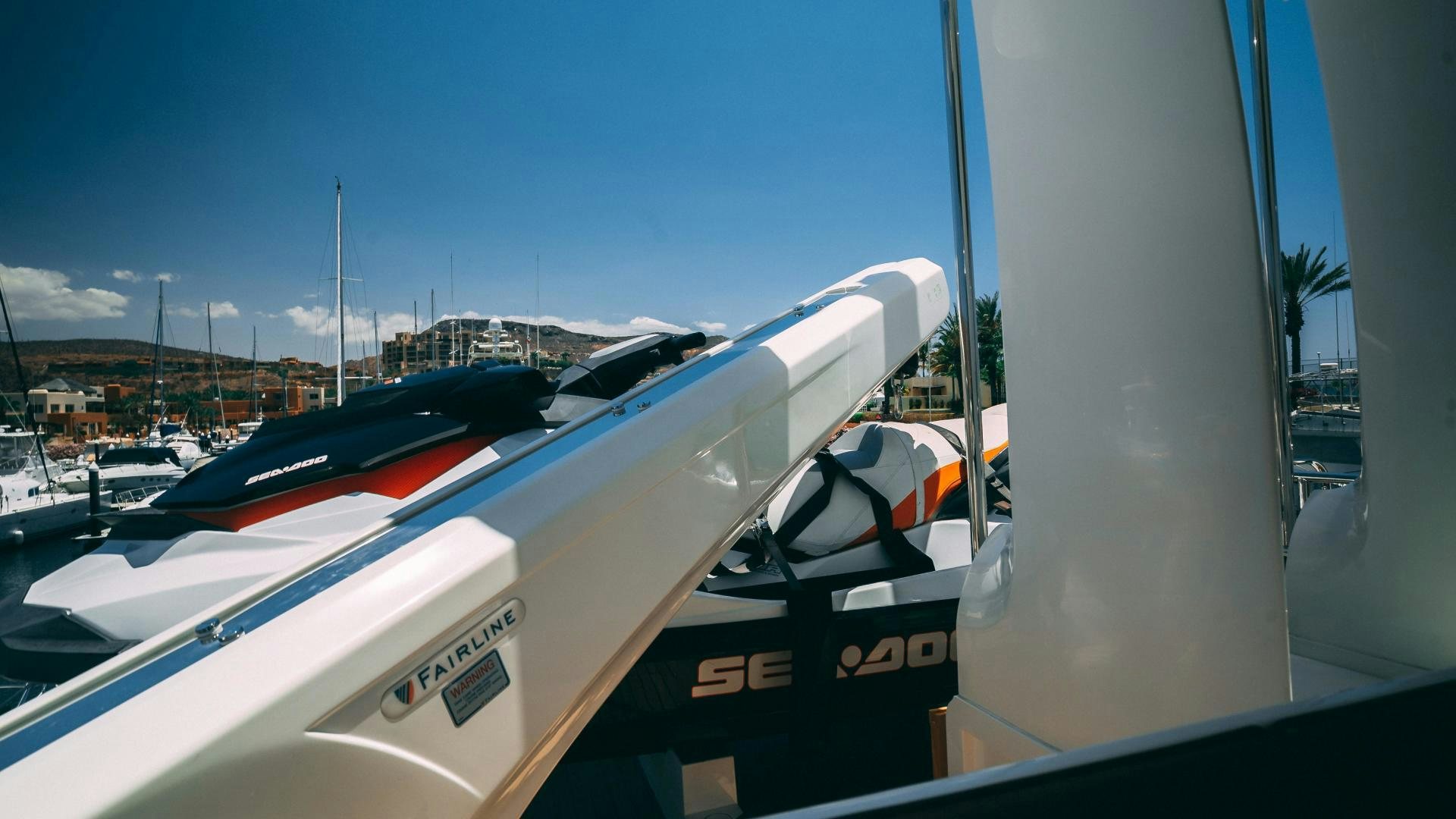 a group of boats are parked in a harbor aboard OCHO UNO Yacht for Sale