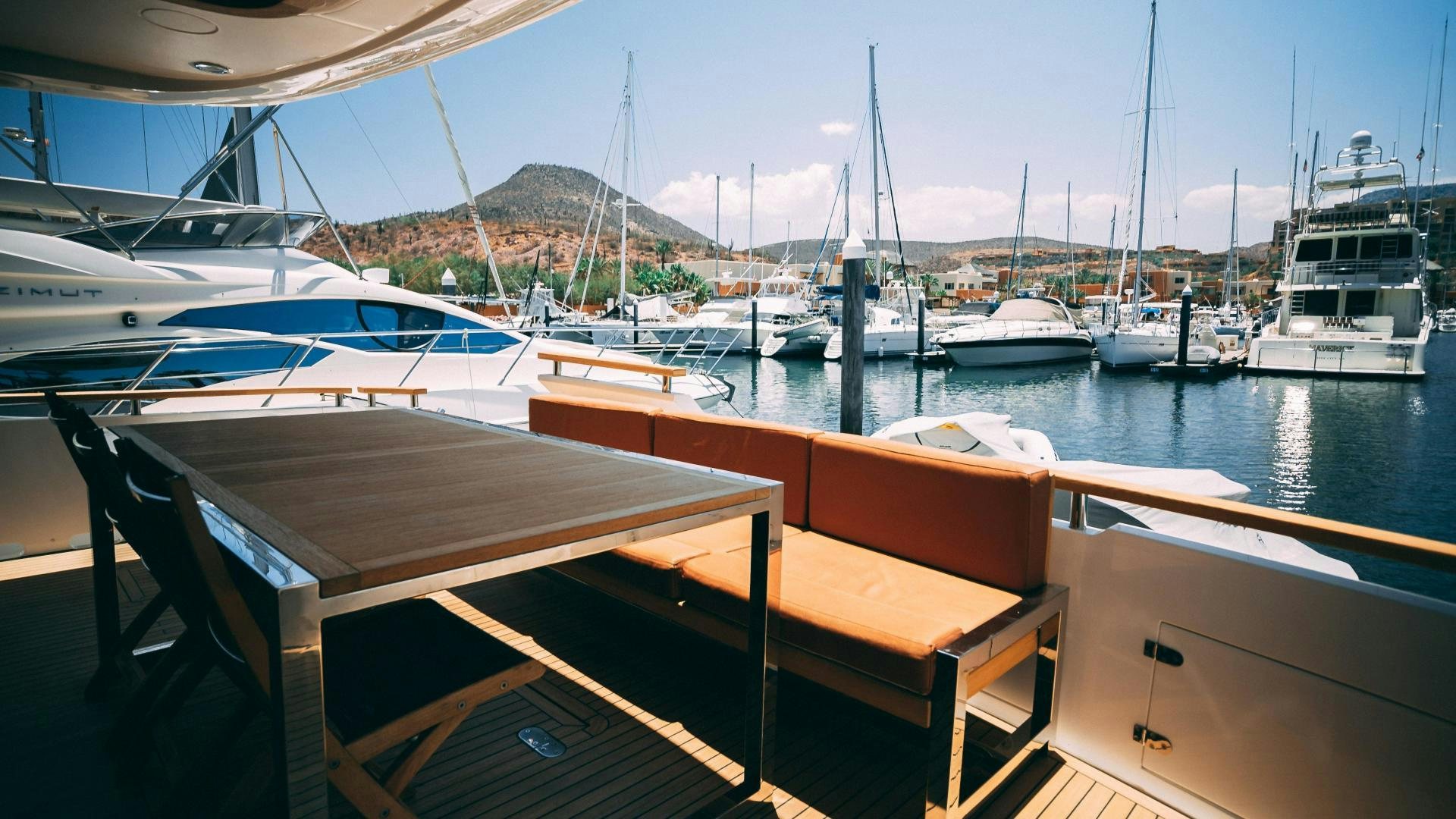 a boat dock with boats aboard OCHO UNO Yacht for Sale