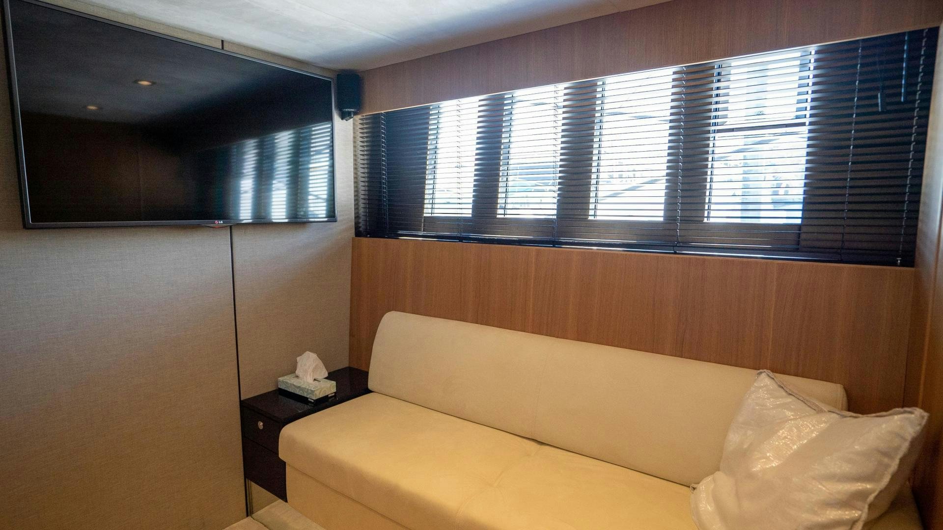 a room with a bed and a window aboard OCHO UNO Yacht for Sale