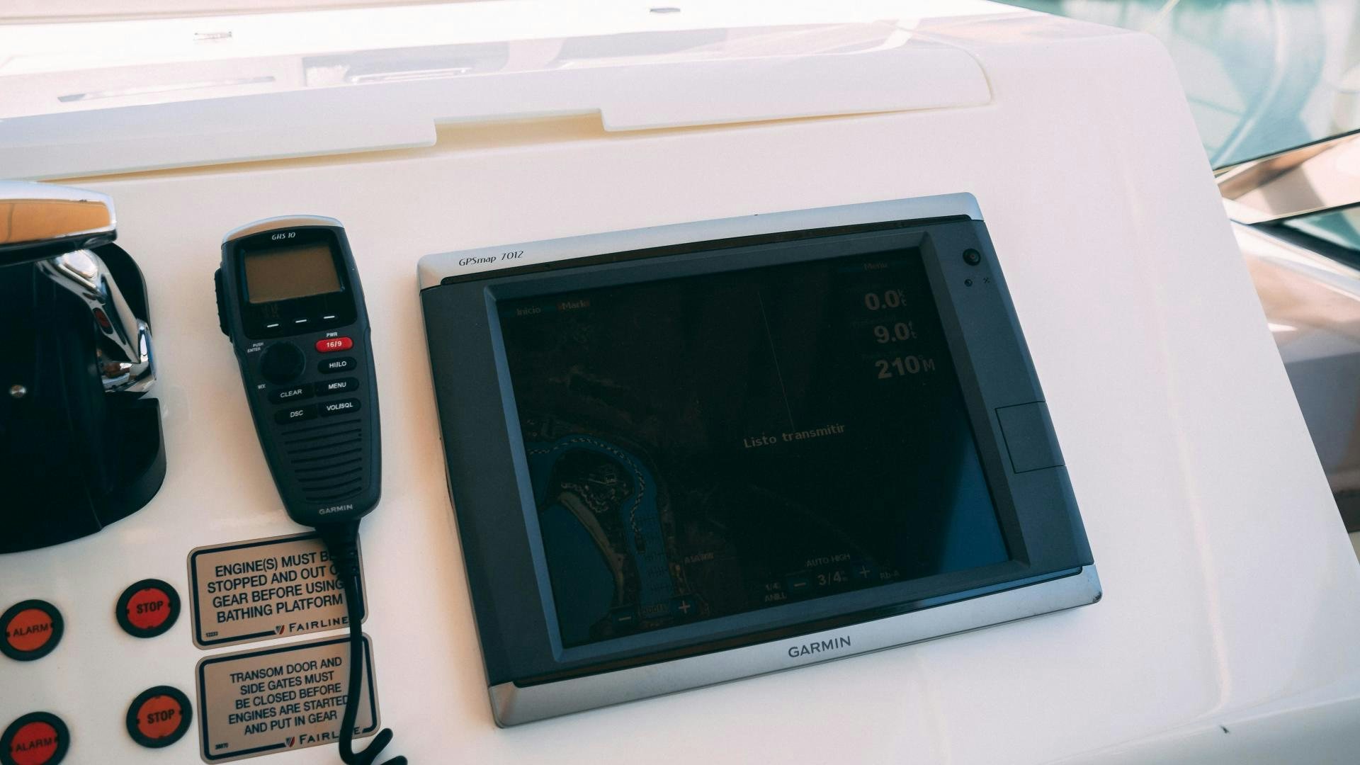 a handheld gaming device aboard OCHO UNO Yacht for Sale