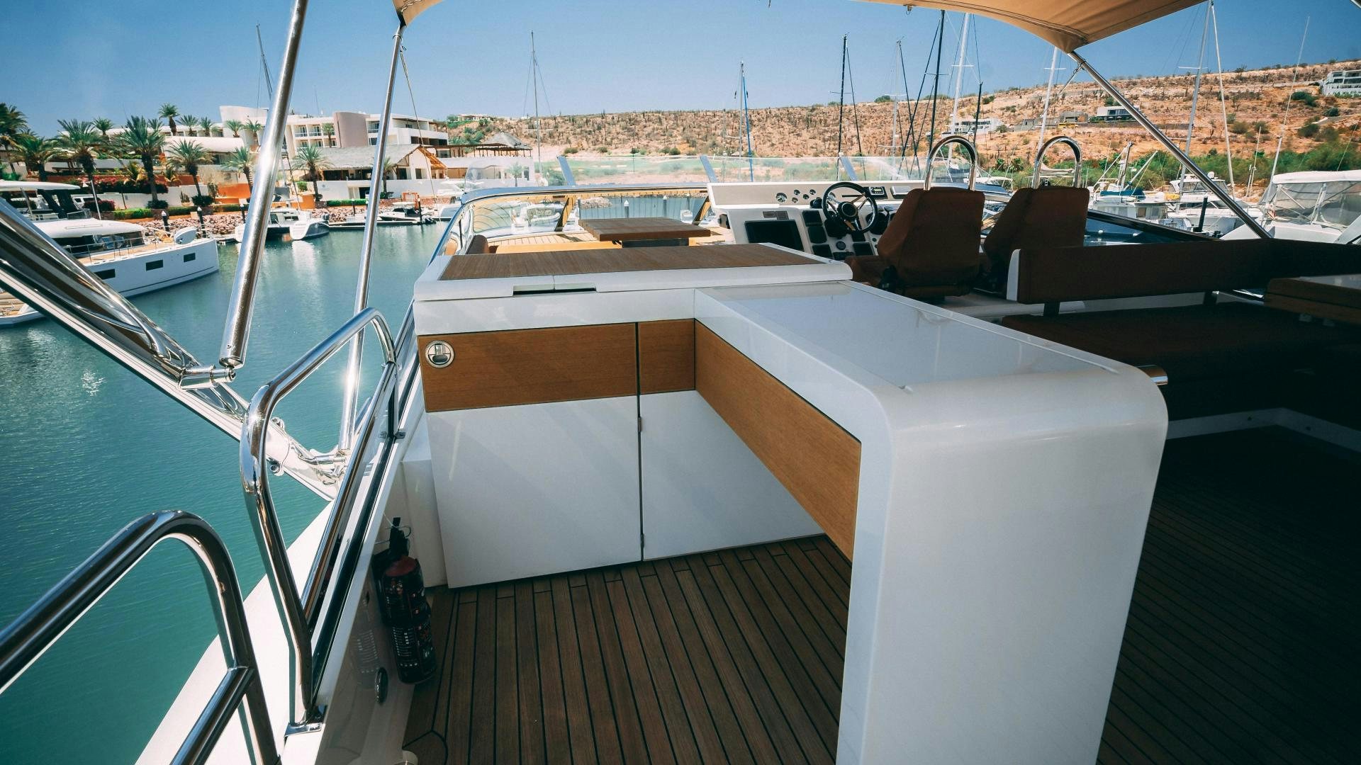 a boat on a deck aboard OCHO UNO Yacht for Sale