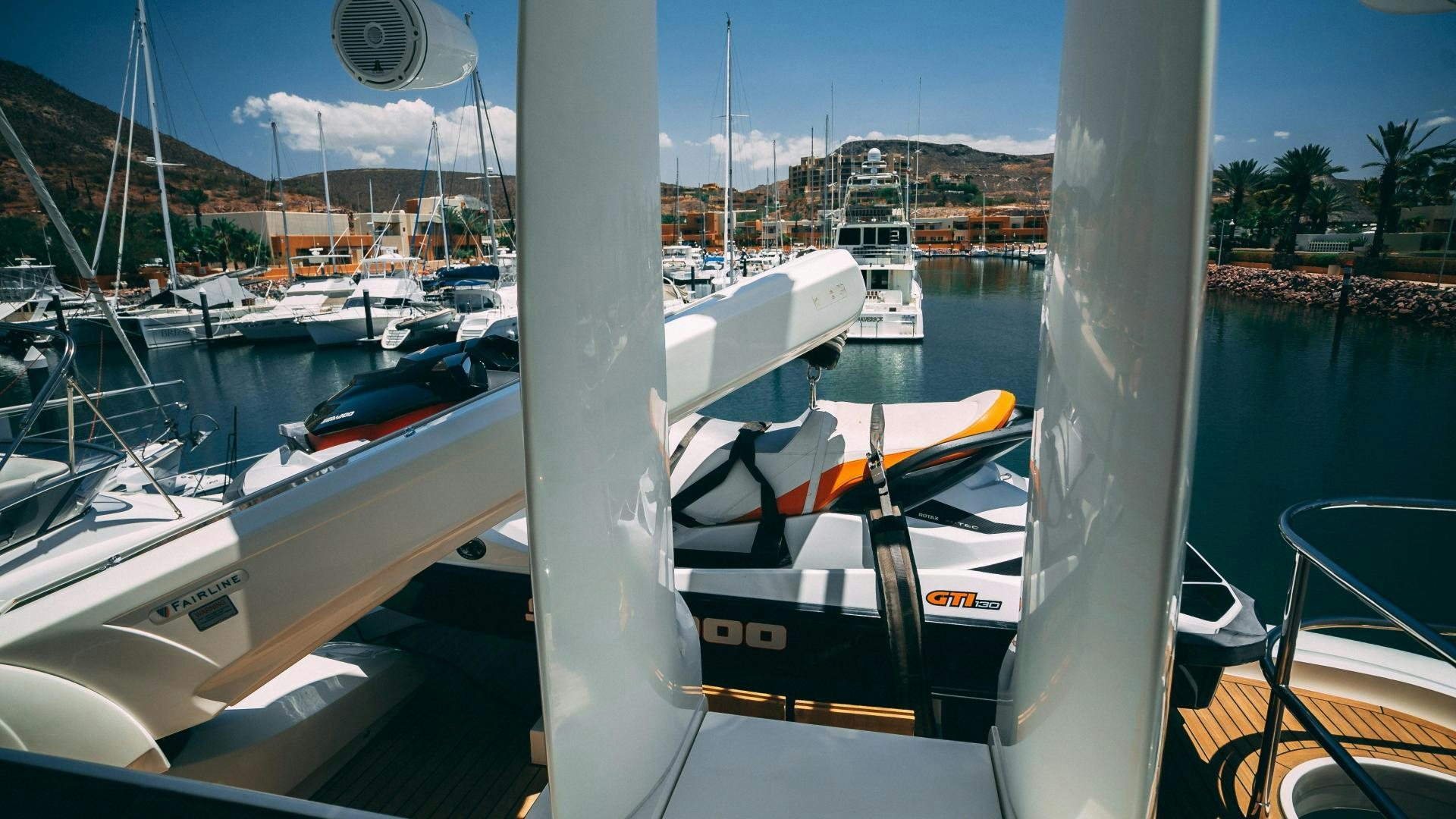 a boat parked in a harbor aboard OCHO UNO Yacht for Sale