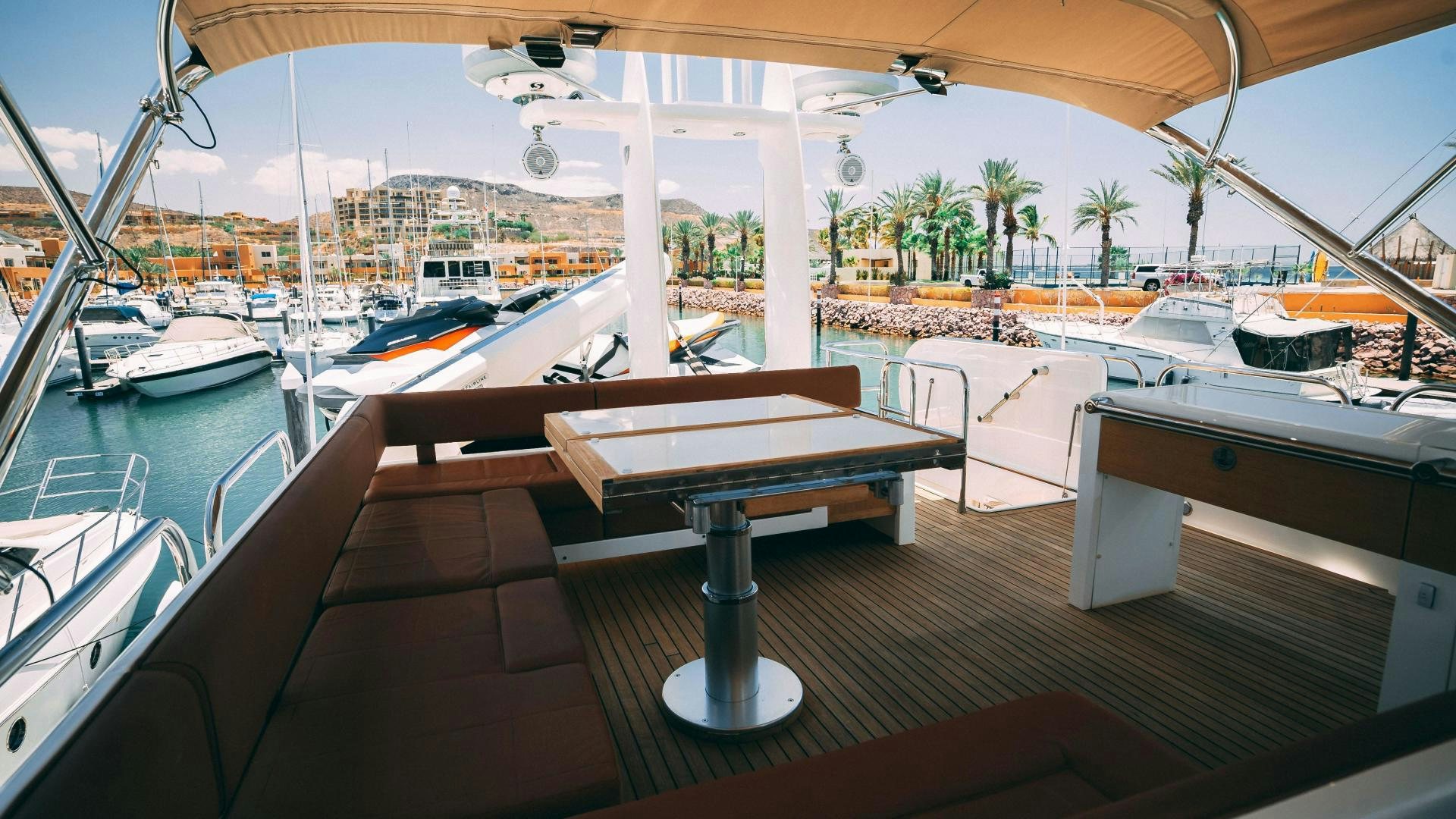 a boat dock with boats aboard OCHO UNO Yacht for Sale