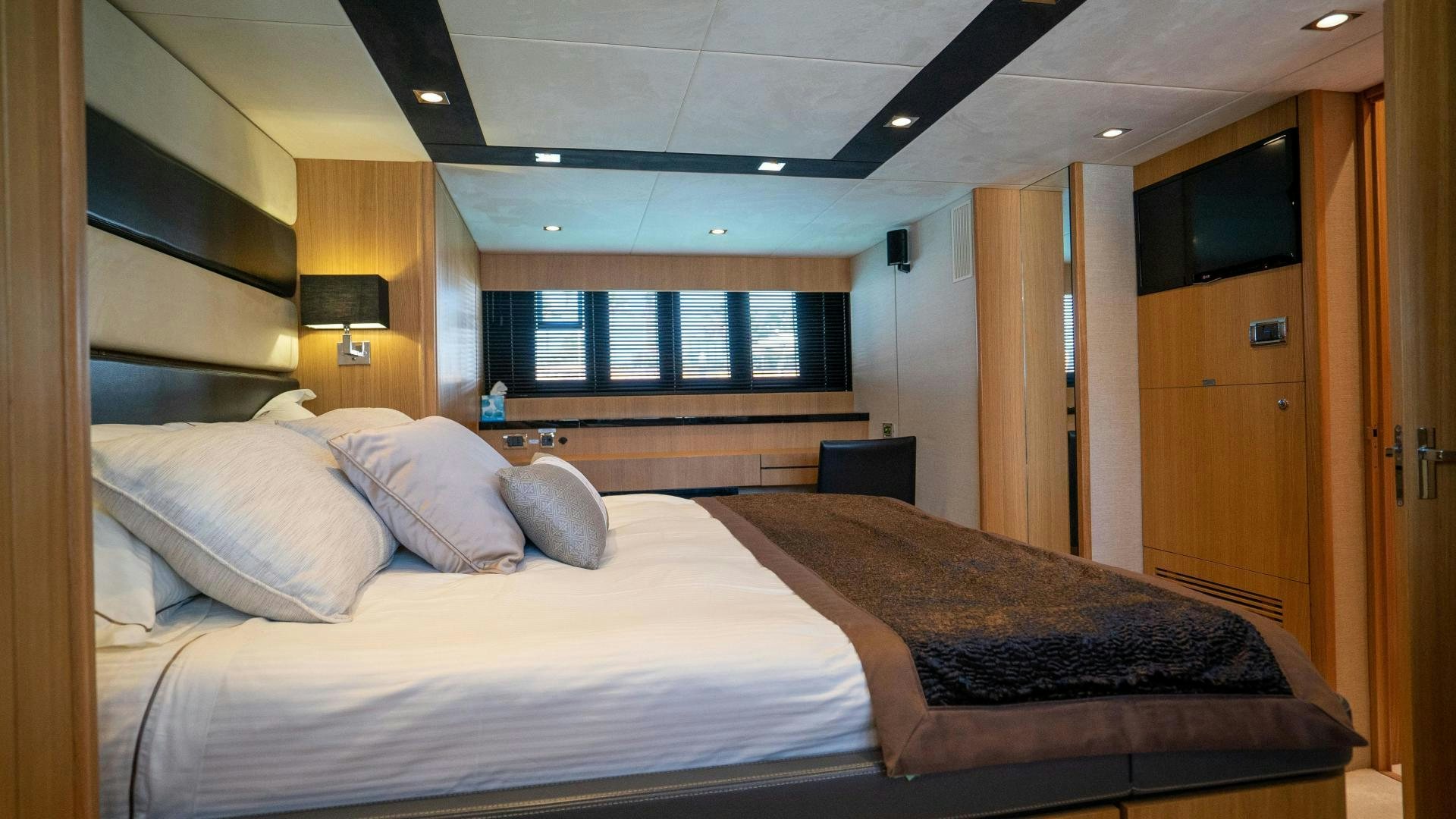 a hotel room with a bed aboard OCHO UNO Yacht for Sale