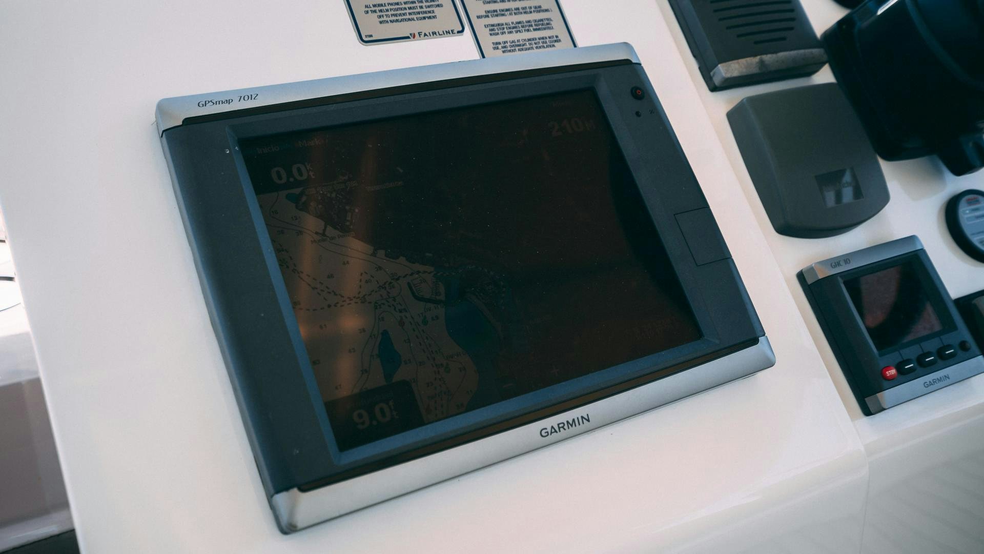 a handheld video game aboard OCHO UNO Yacht for Sale