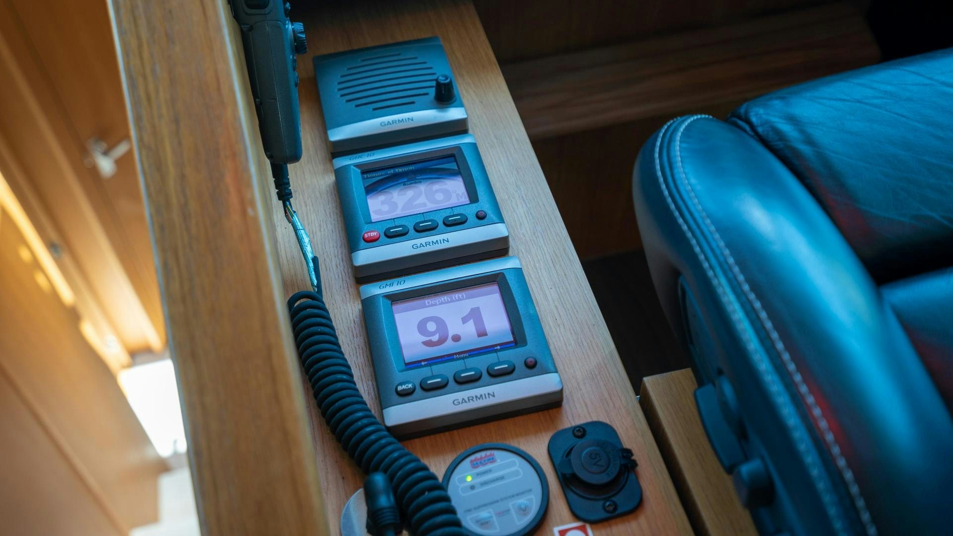 a machine on the shelf aboard OCHO UNO Yacht for Sale