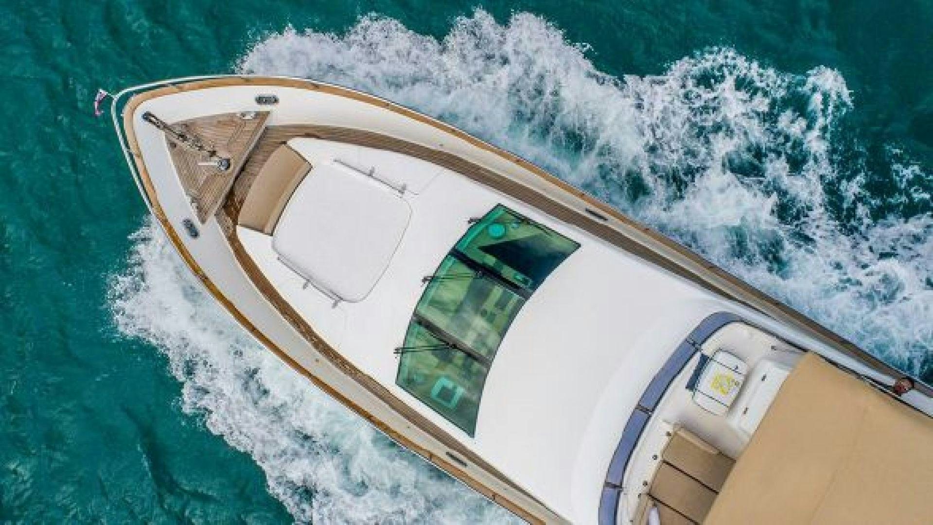 a boat on the water aboard NO LIMITS Yacht for Sale