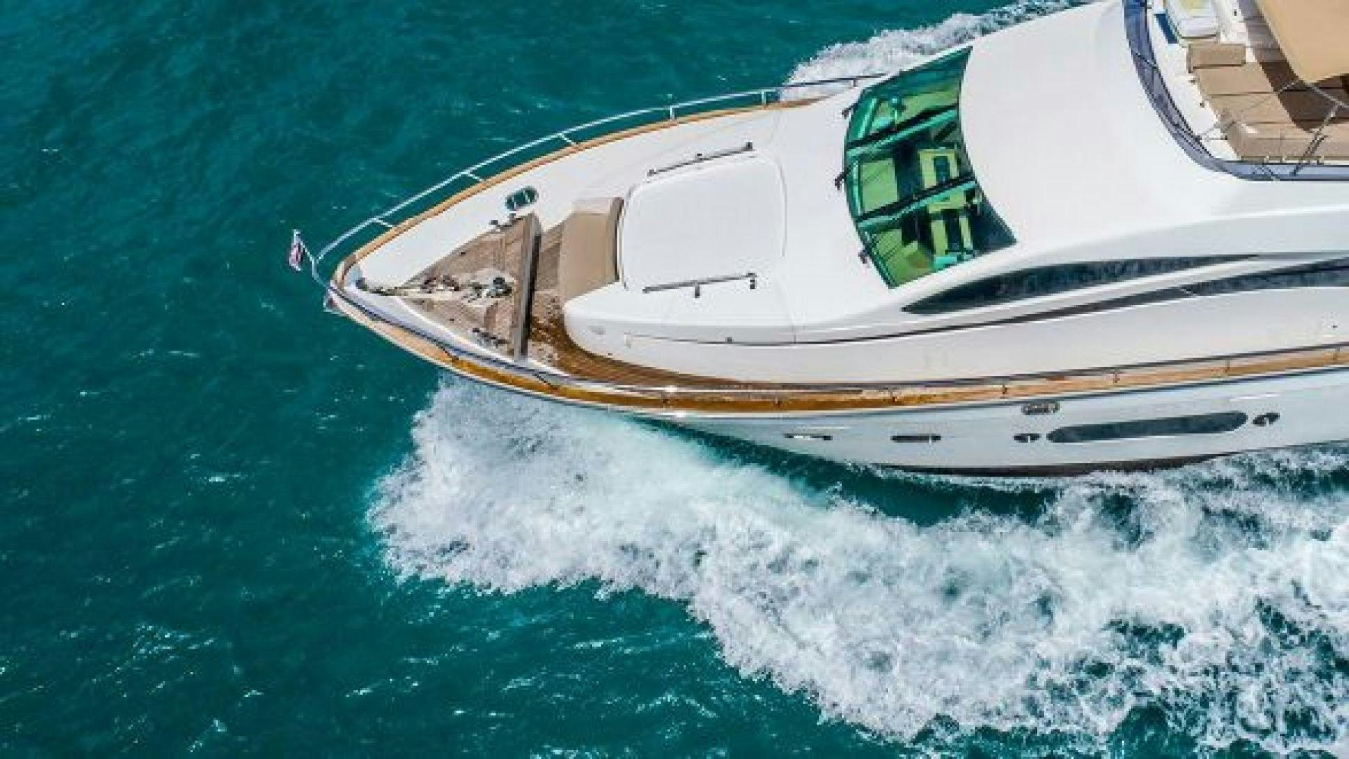 a boat on the water aboard NO LIMITS Yacht for Sale