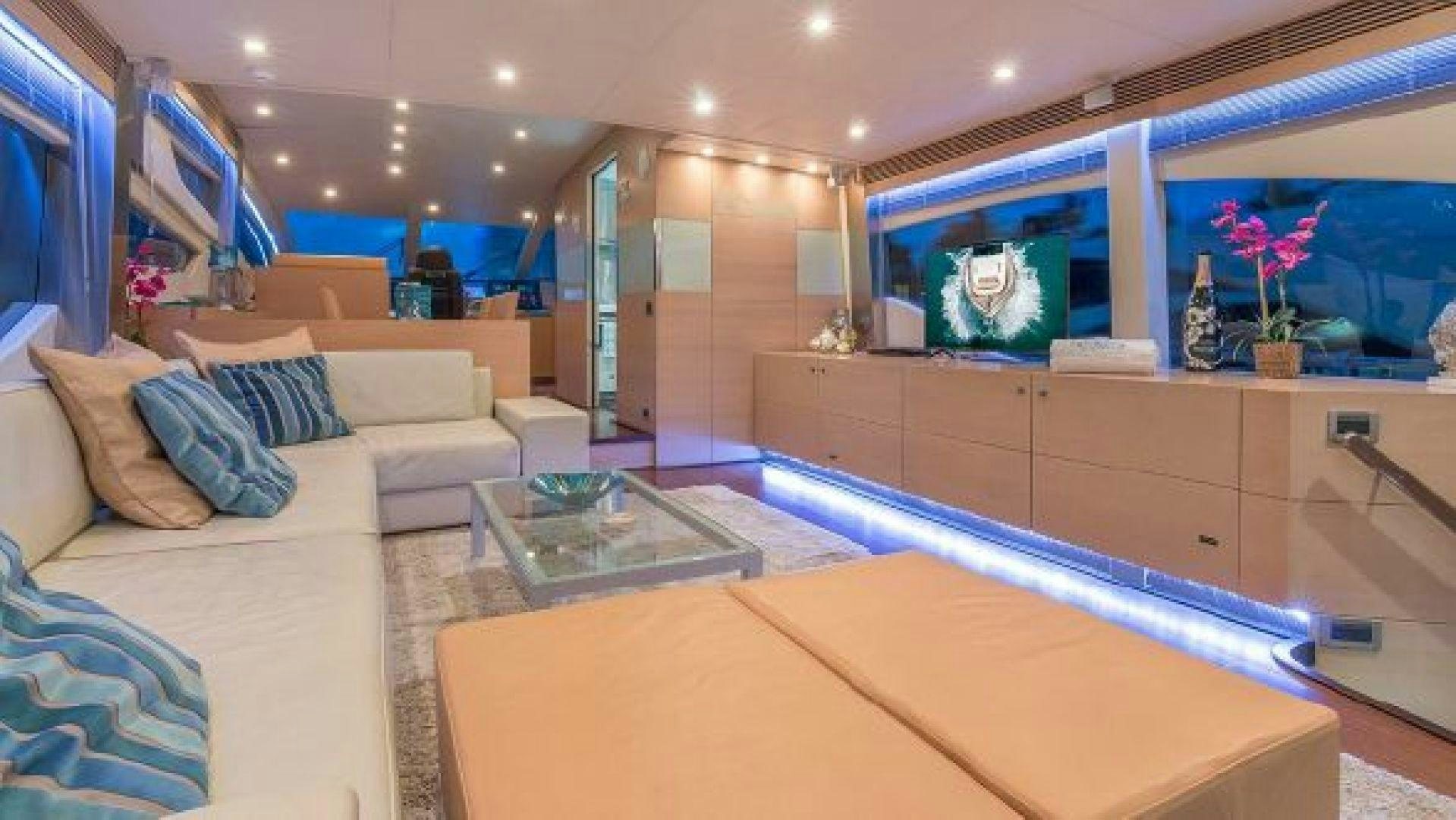 a modern looking living room aboard NO LIMITS Yacht for Sale