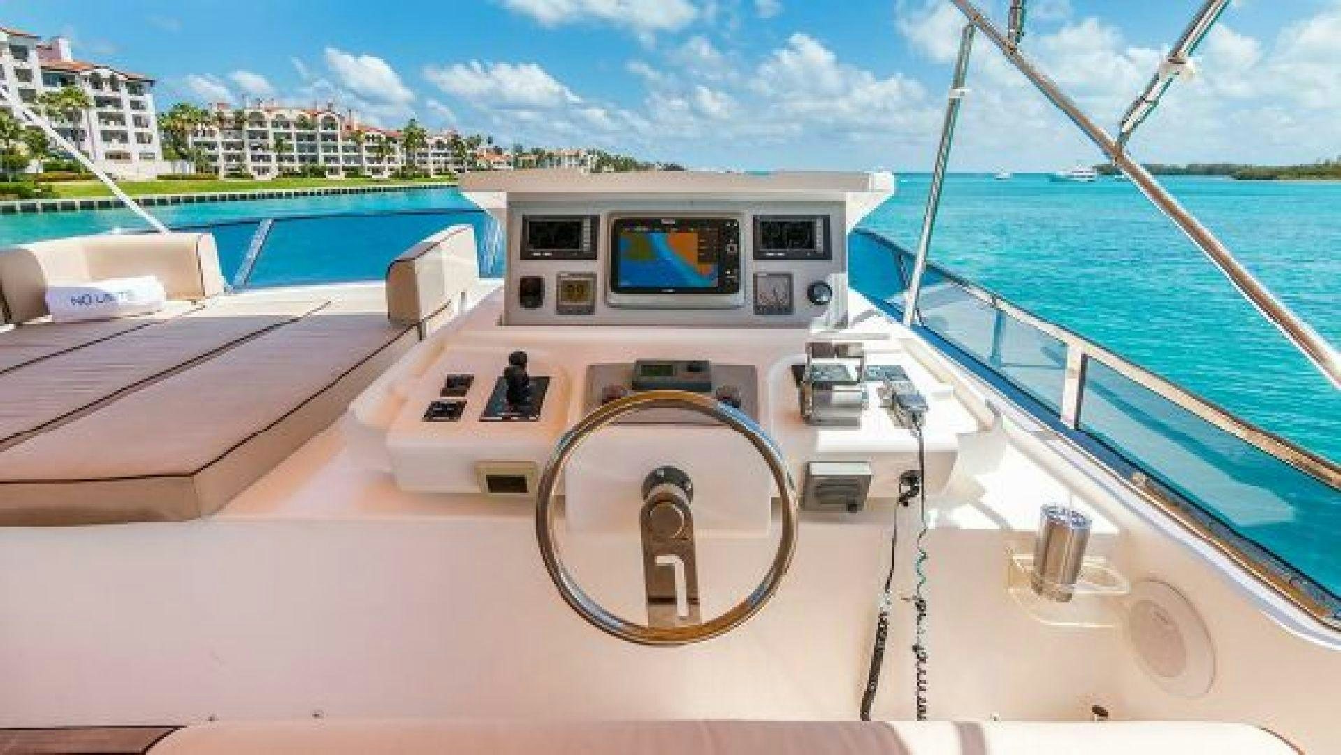 a boat on a body of water aboard NO LIMITS Yacht for Sale