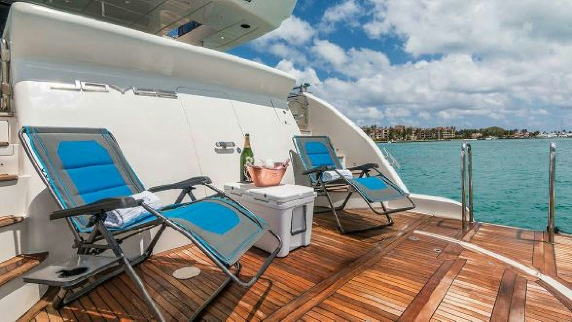 a boat on a deck aboard NO LIMITS Yacht for Sale