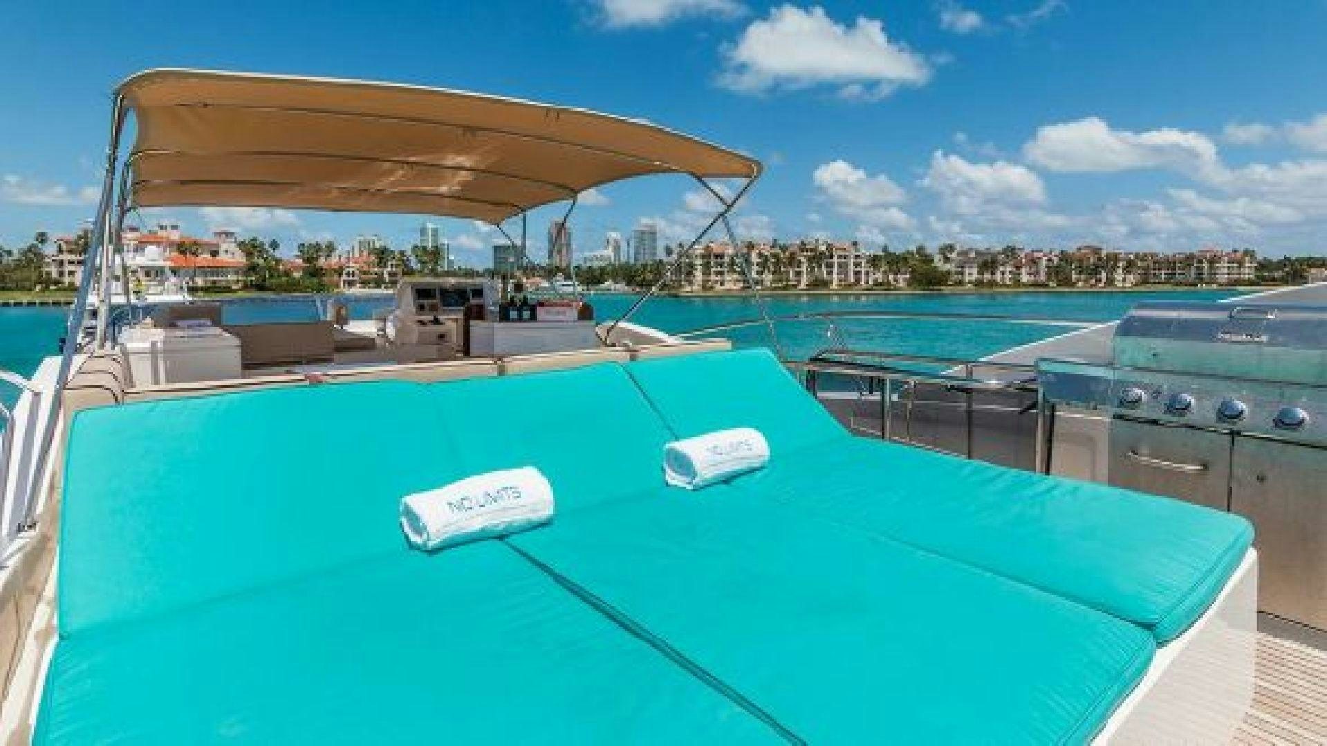 a large pool with a laptop on it aboard NO LIMITS Yacht for Sale