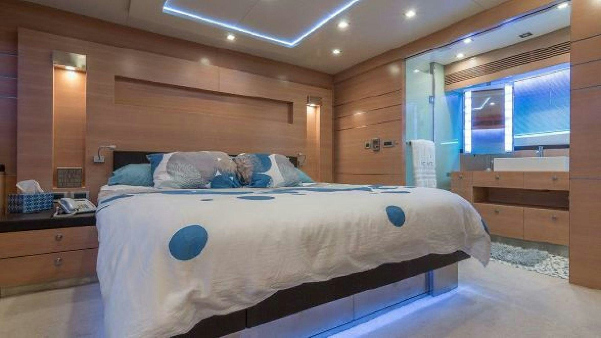 a bed in a room aboard NO LIMITS Yacht for Sale