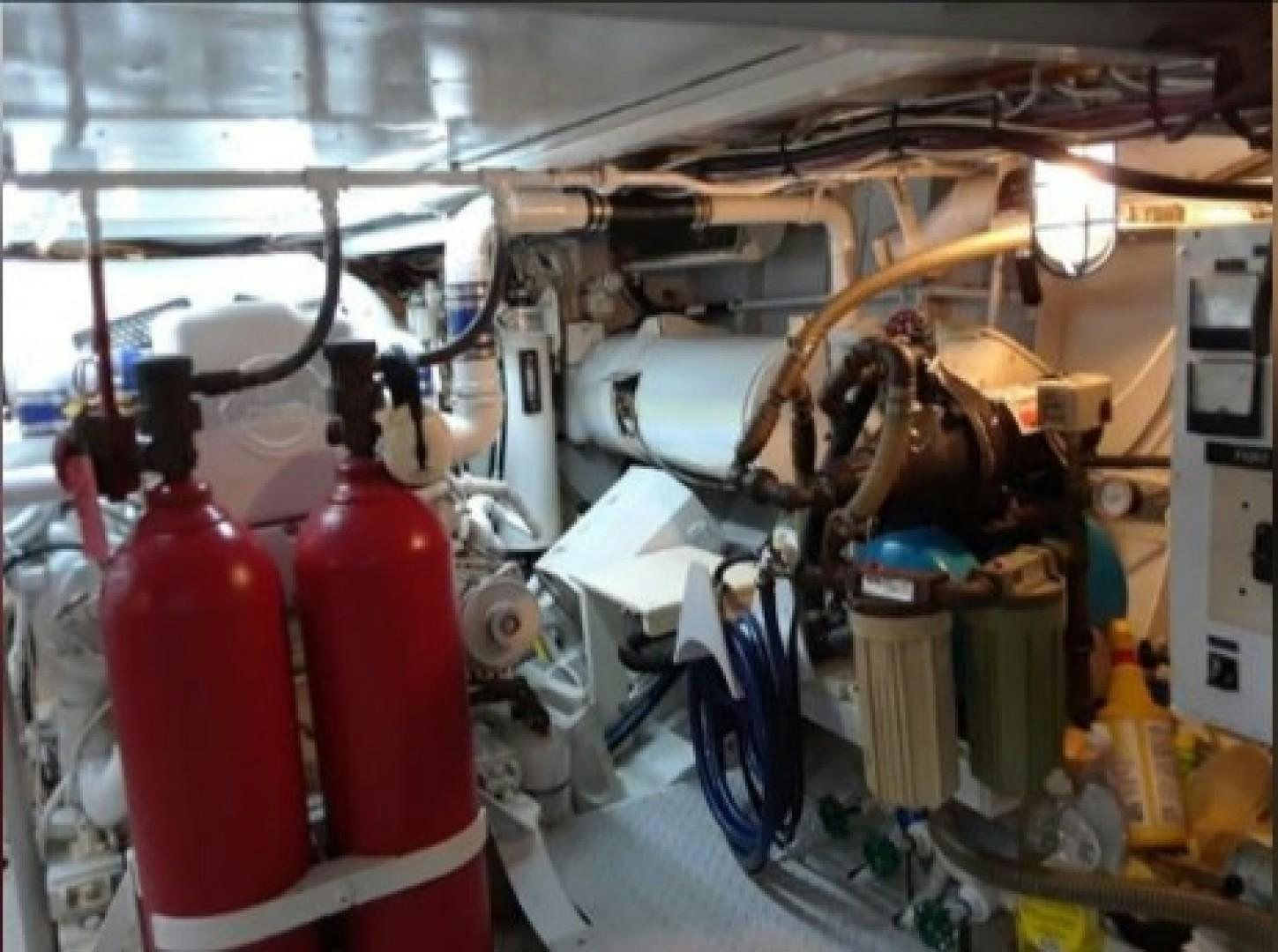 a factory with red and yellow machinery aboard FANTASEA Yacht for Sale