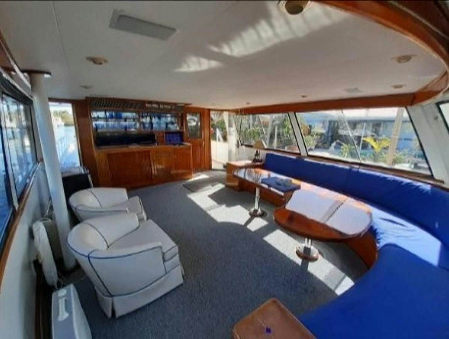 a boat with a view of the water and the land below aboard FANTASEA Yacht for Sale