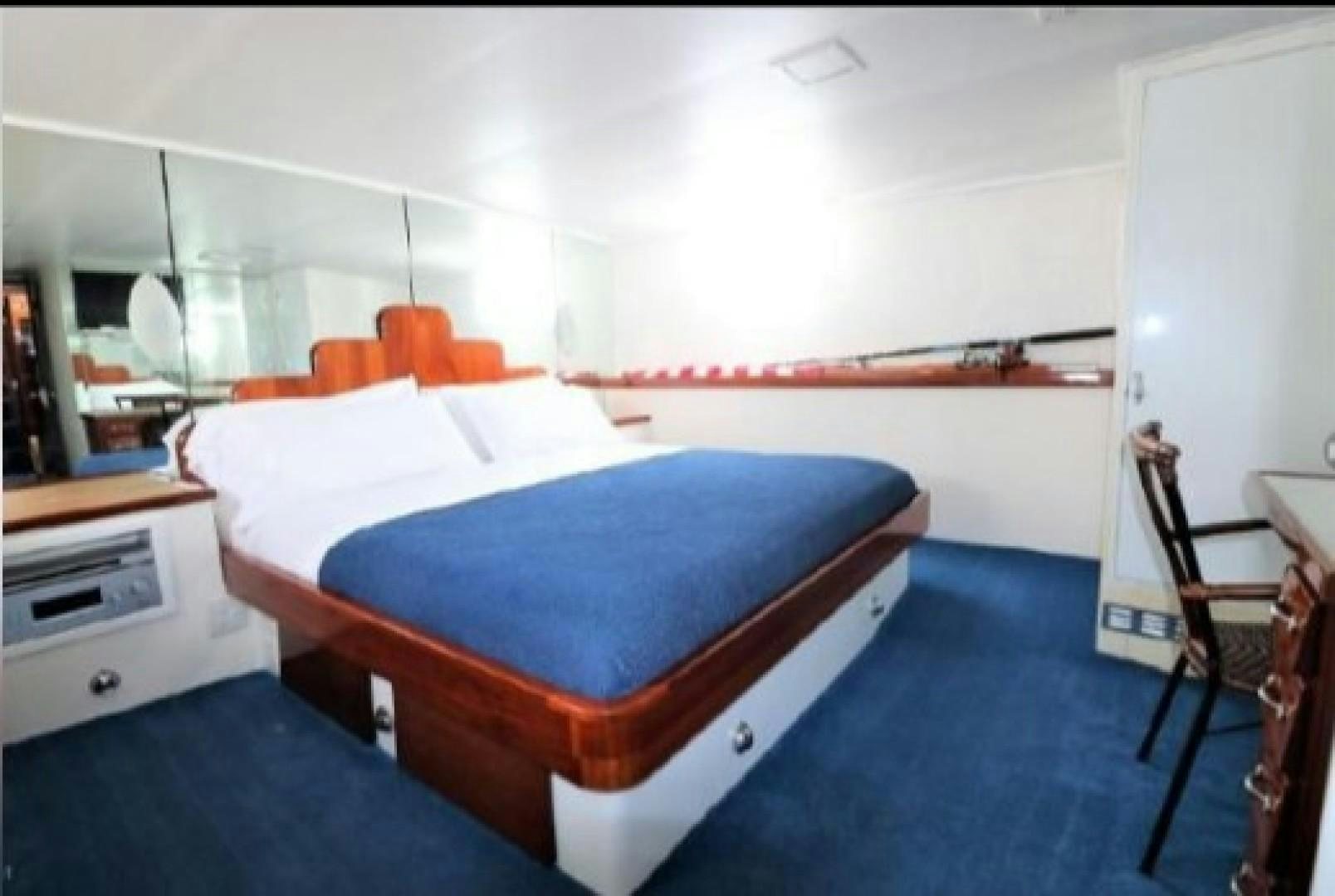 a bed in a room aboard FANTASEA Yacht for Sale