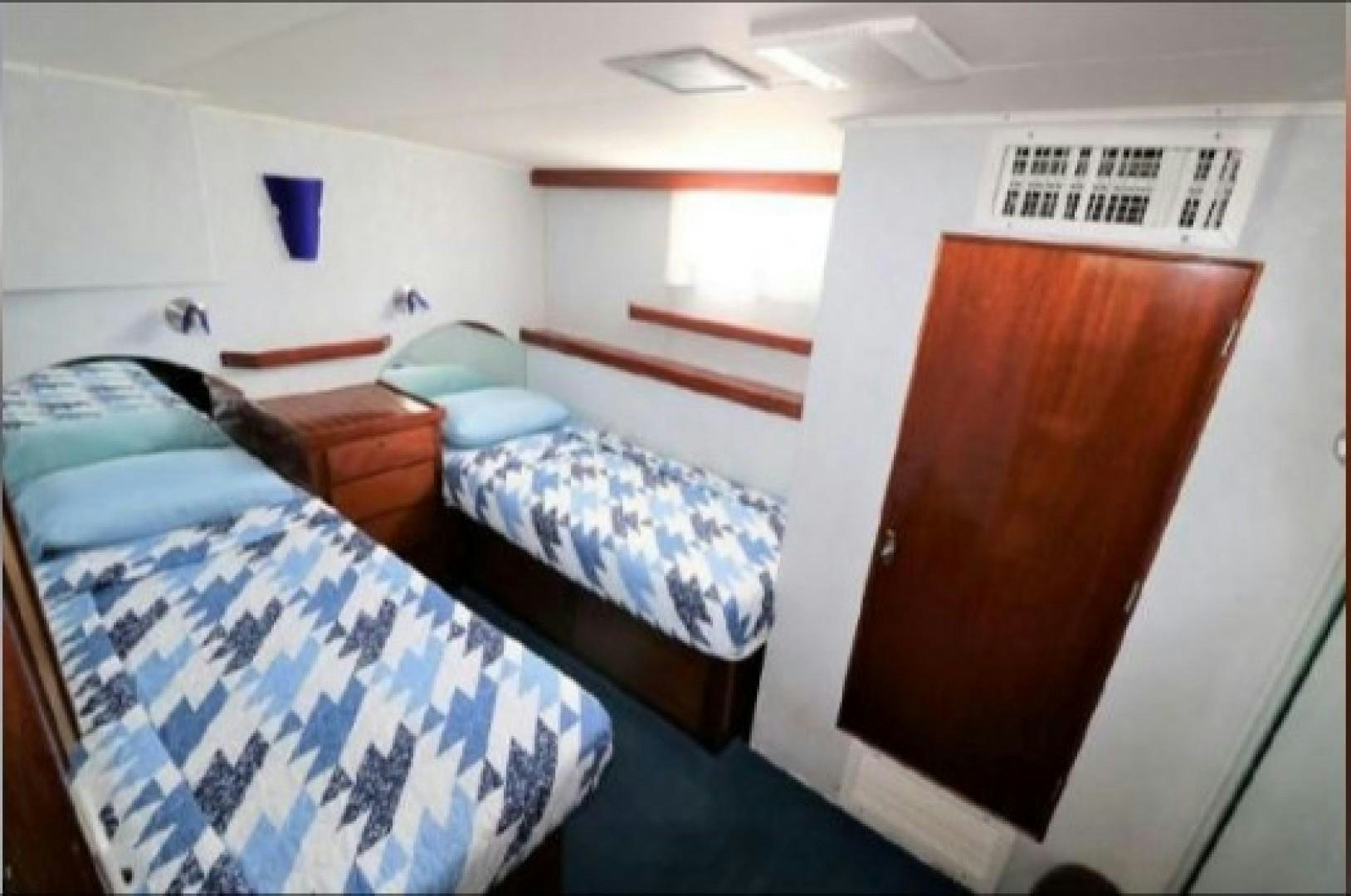 a couple of beds in a room aboard FANTASEA Yacht for Sale
