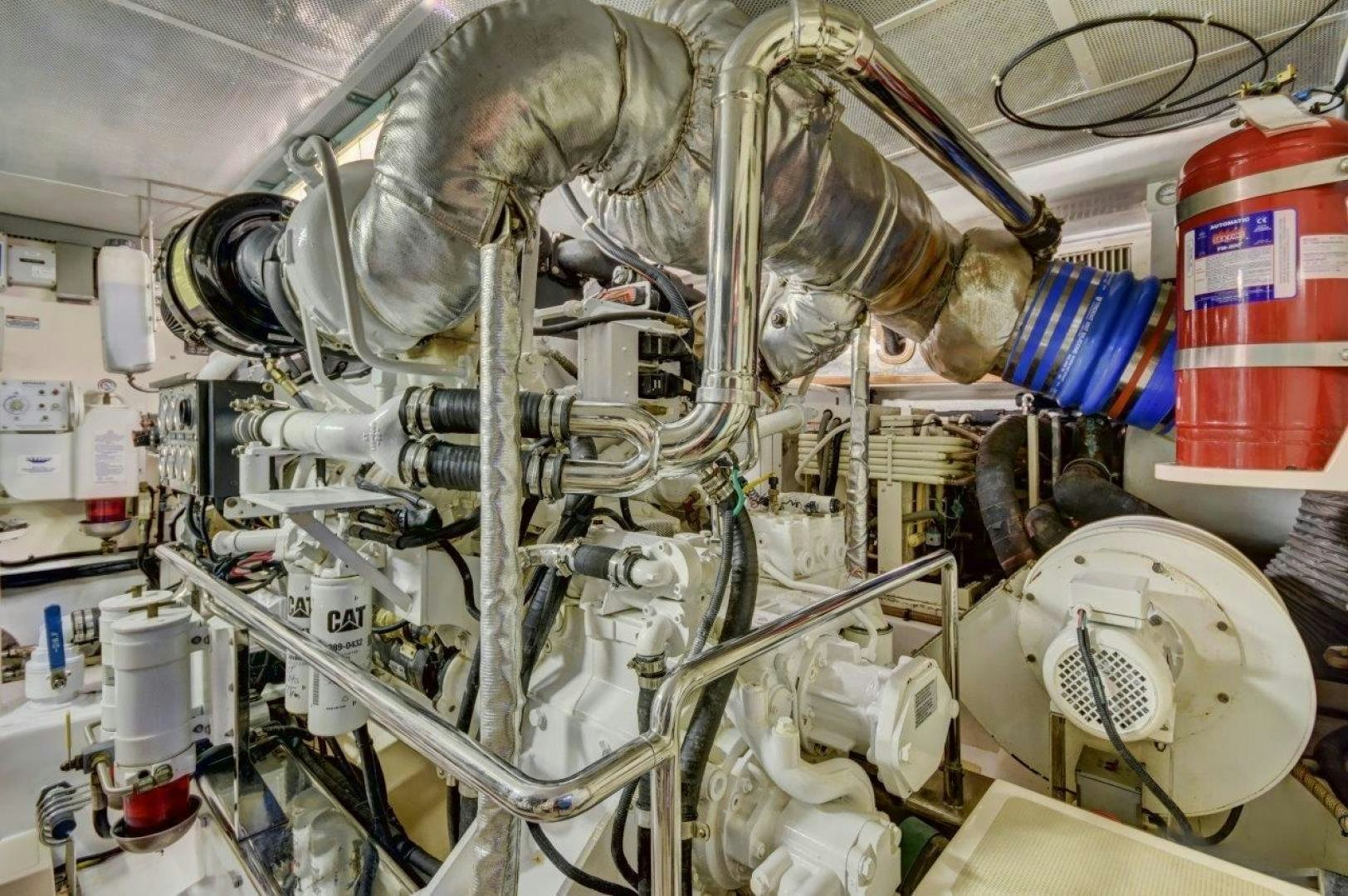 a large machine with a large metal cylinder aboard INEVITABLE Yacht for Sale