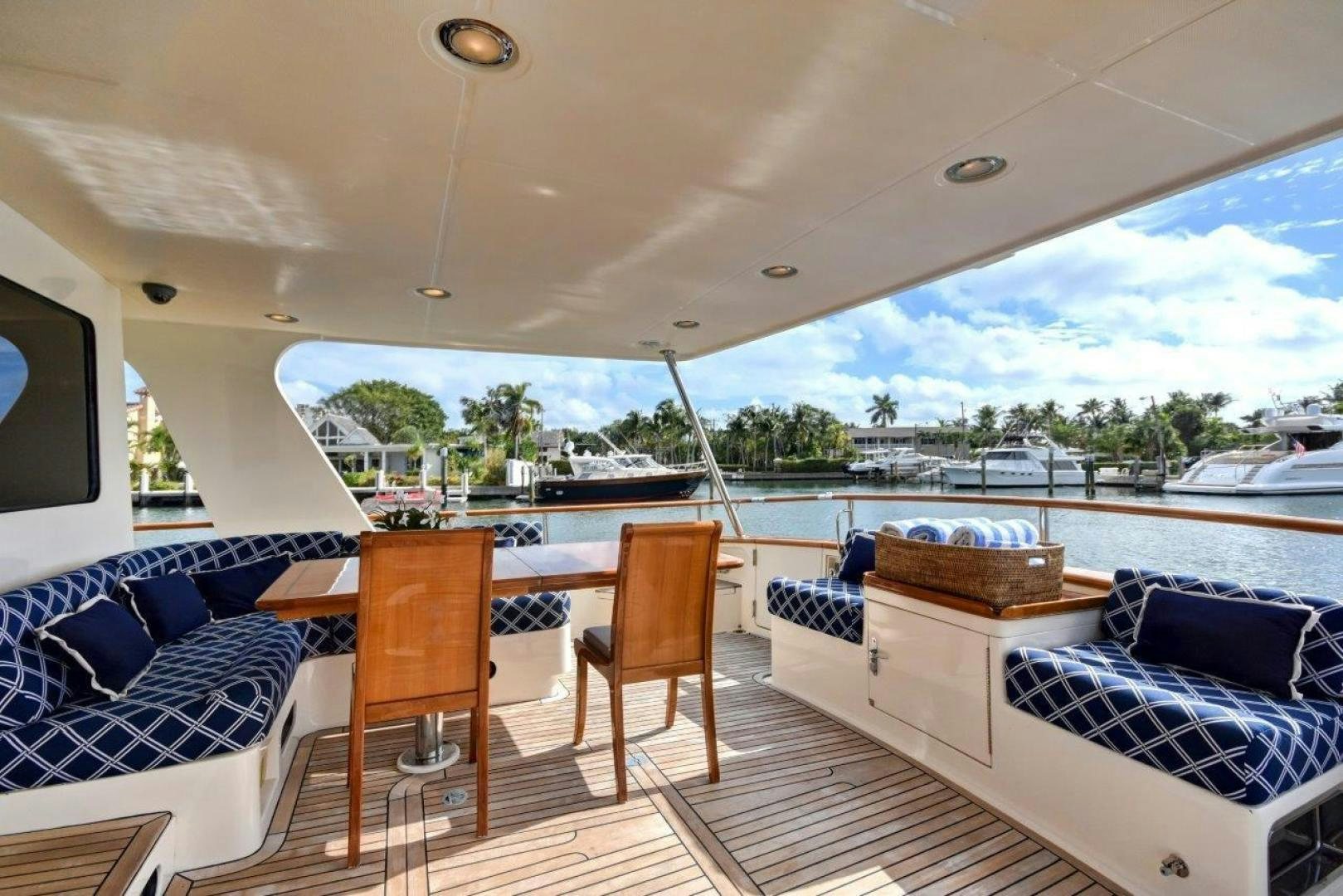 a large balcony overlooking a beach aboard INEVITABLE Yacht for Sale