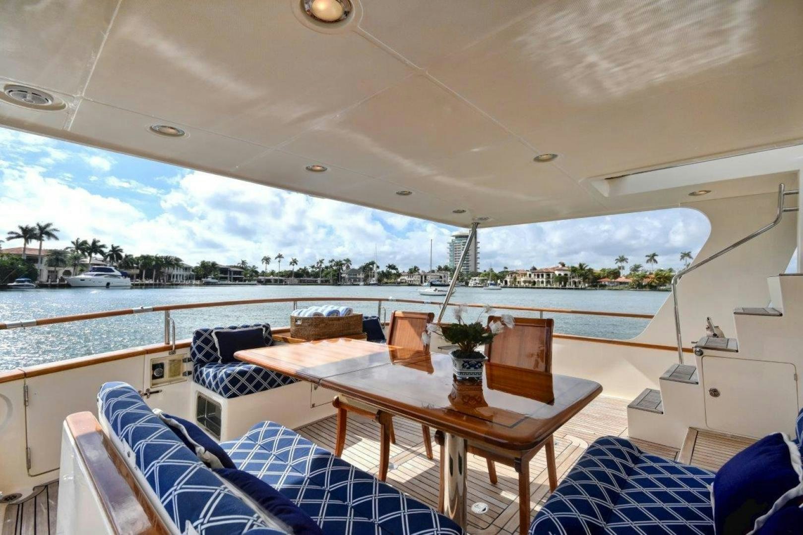 a table and chairs on a boat aboard INEVITABLE Yacht for Sale