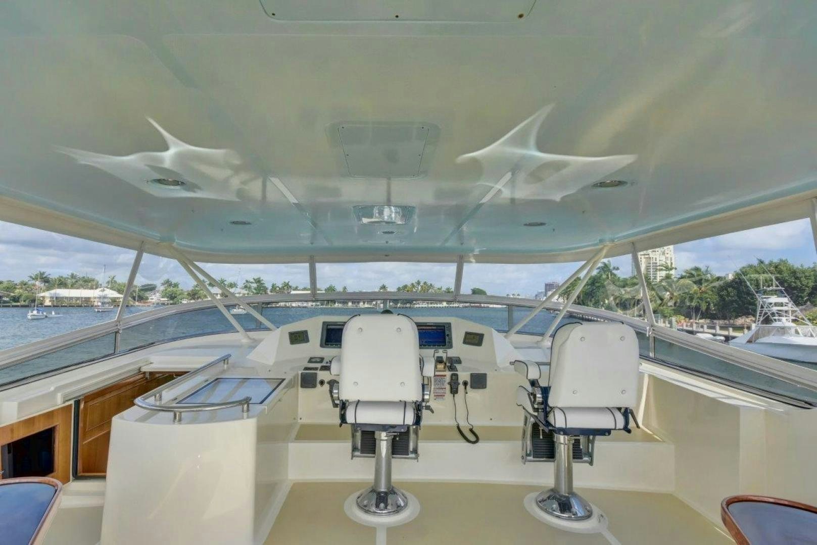 a large white airplane in a hangar aboard INEVITABLE Yacht for Sale