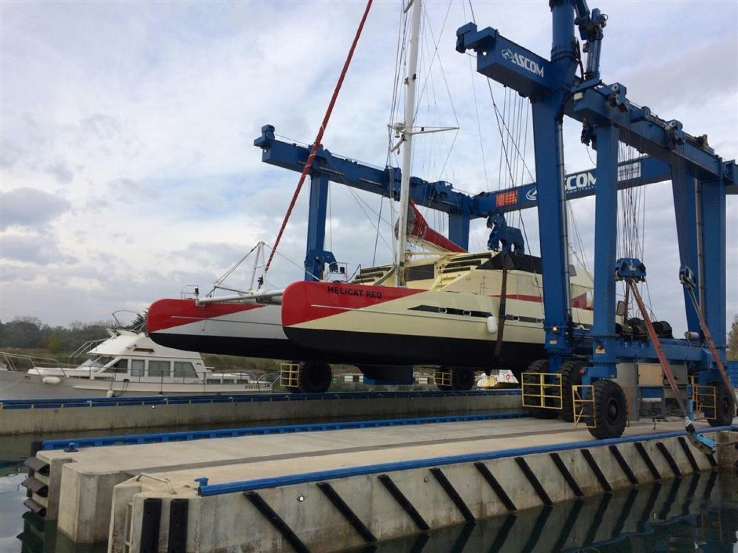 a boat on a dock aboard HELICAT RED Yacht for Sale