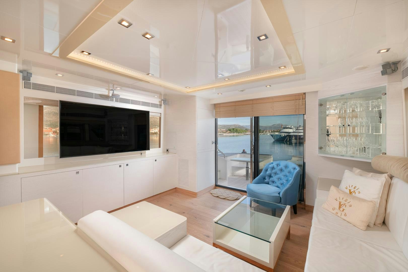 a modern looking living room aboard VIRGIN GOLD Yacht for Sale
