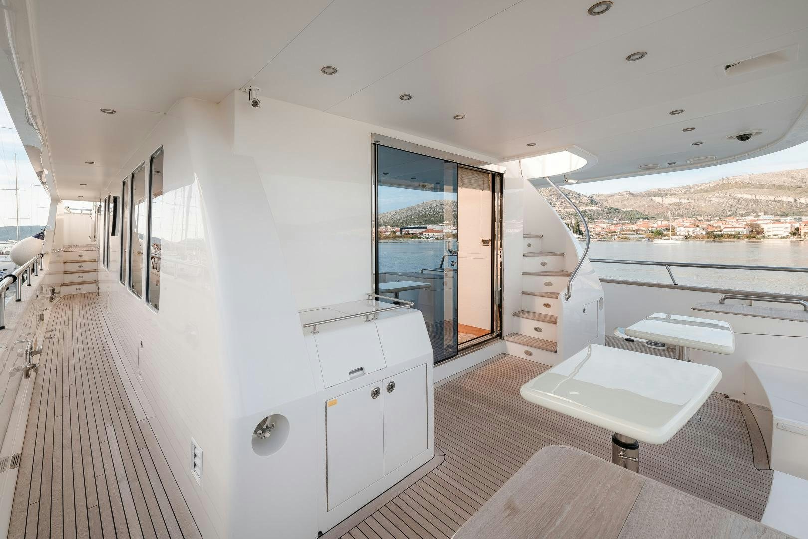 a room with a large white tub and a large window aboard VIRGIN GOLD Yacht for Sale