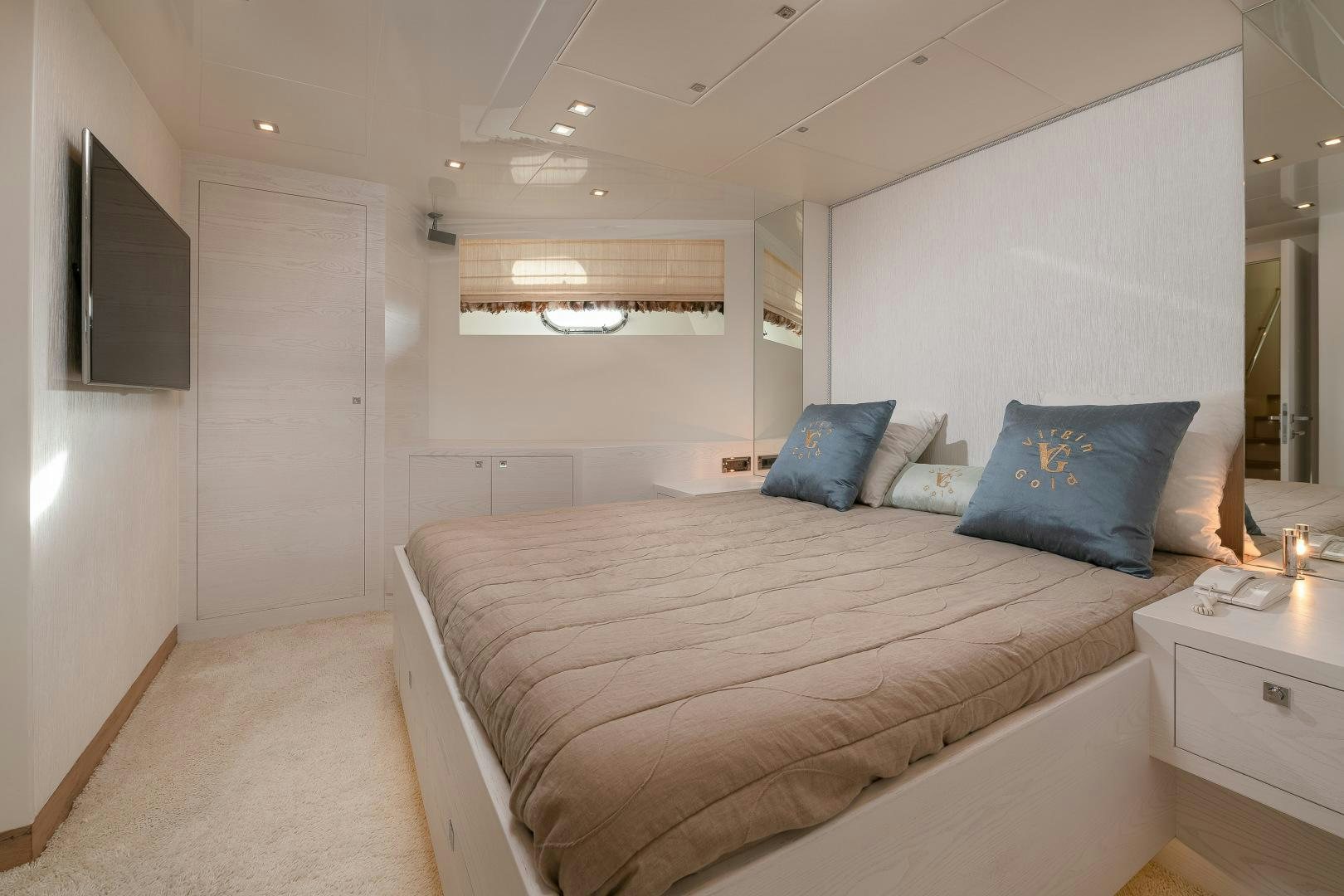 a bed in a room aboard VIRGIN GOLD Yacht for Sale