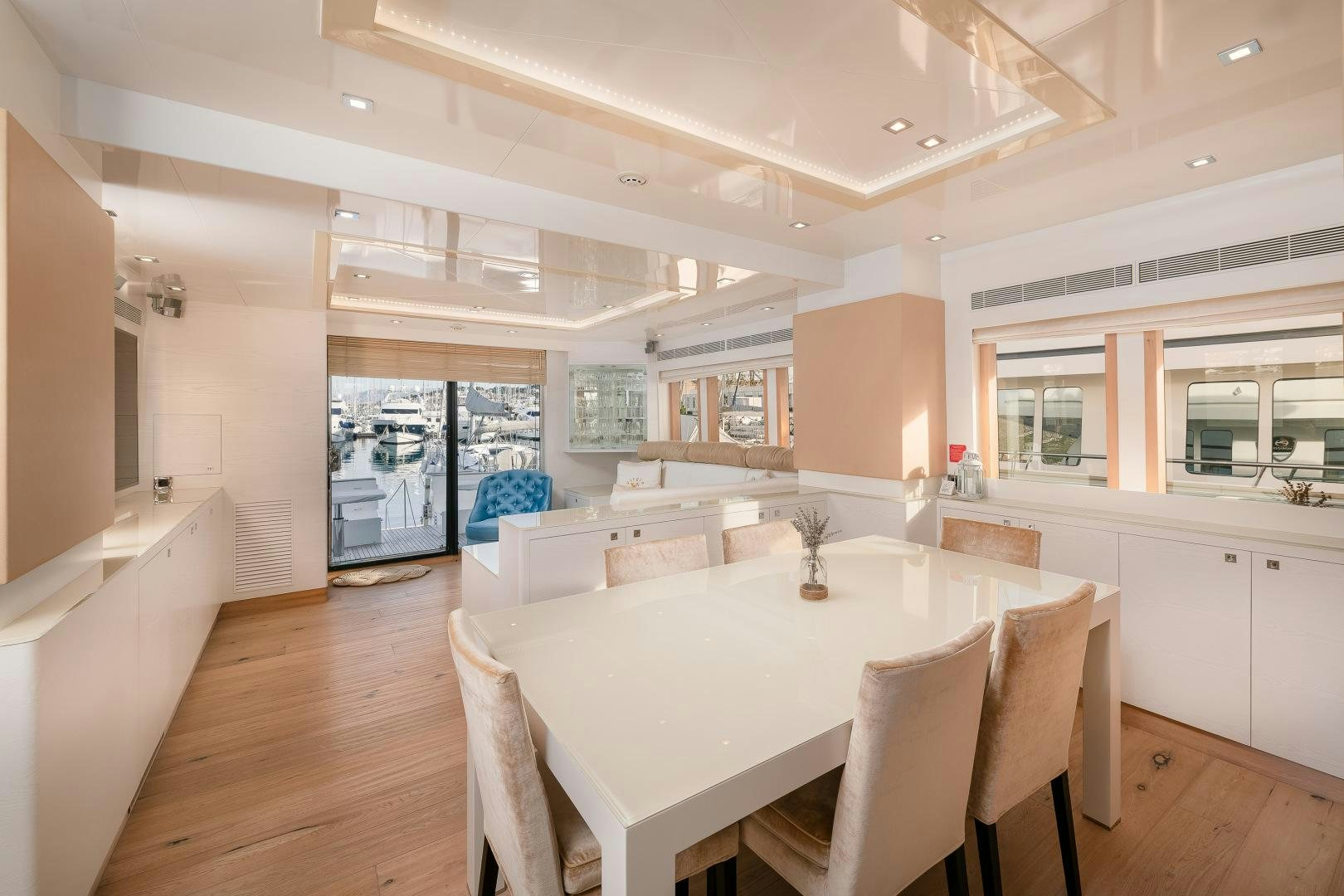 a kitchen with a dining table aboard VIRGIN GOLD Yacht for Sale