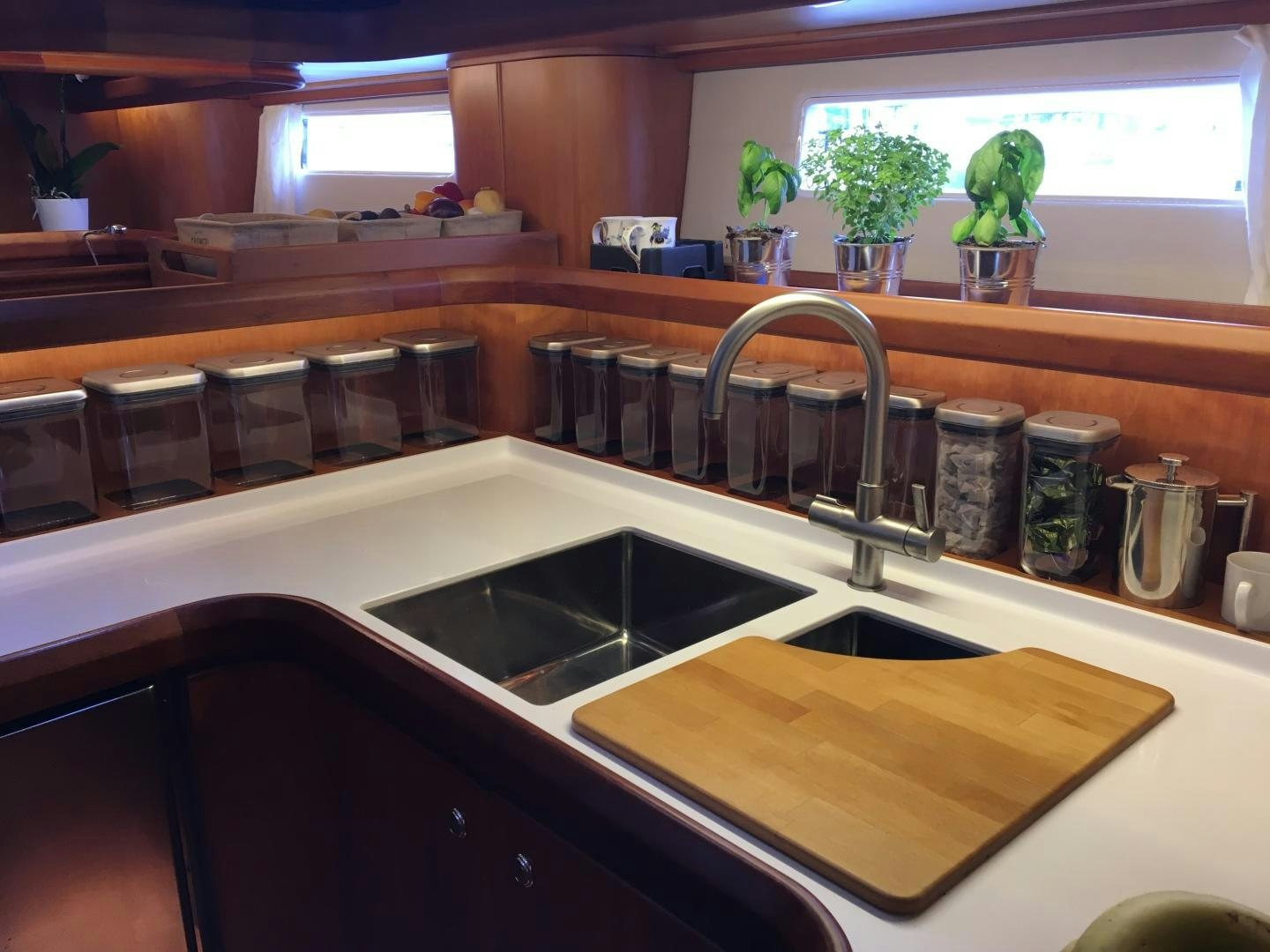 a kitchen with a sink and cabinets aboard aglaia Yacht for Sale
