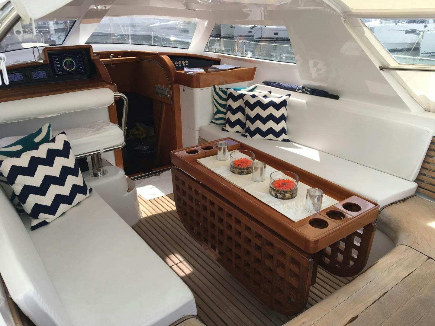 a boat with a table and chairs aboard aglaia Yacht for Sale