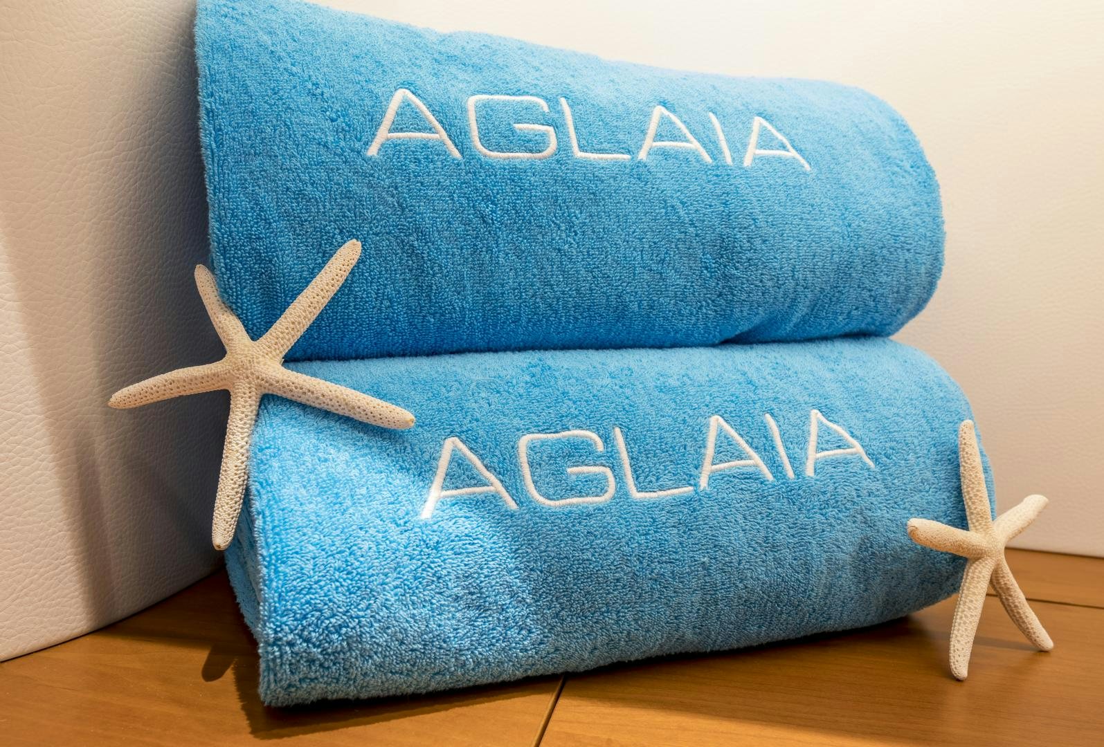 a blue pillow with a star on it aboard aglaia Yacht for Sale