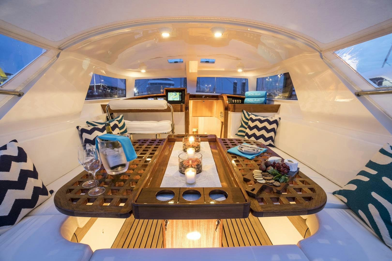 a room with a table and chairs aboard aglaia Yacht for Sale