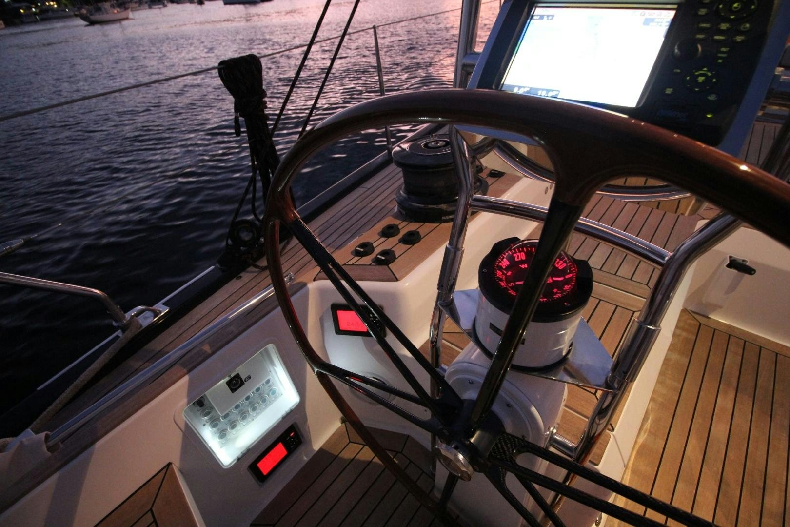 a steering wheel and dashboard of a car aboard kiamar Yacht for Sale
