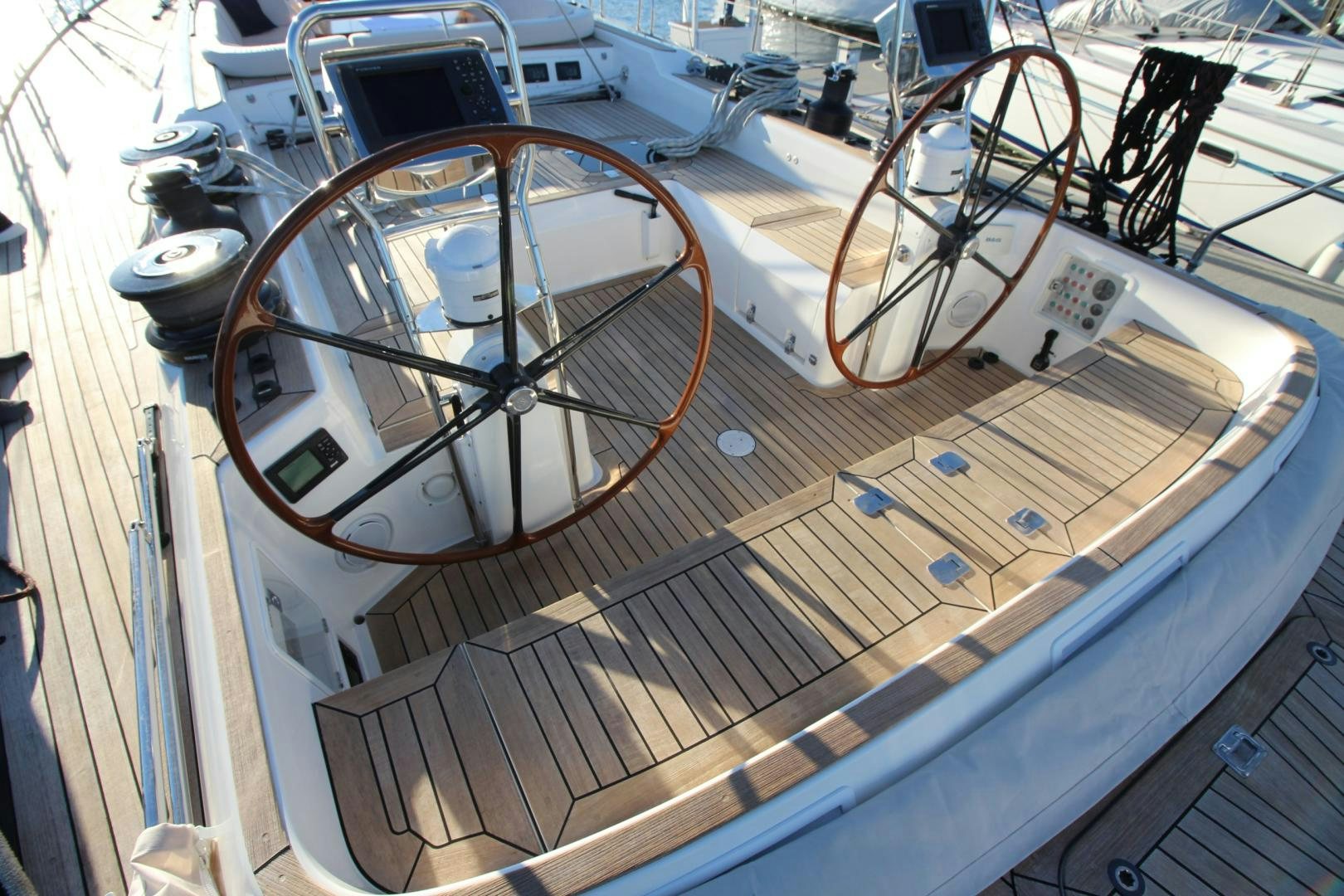 a steering wheel and a wheel on a boat aboard kiamar Yacht for Sale