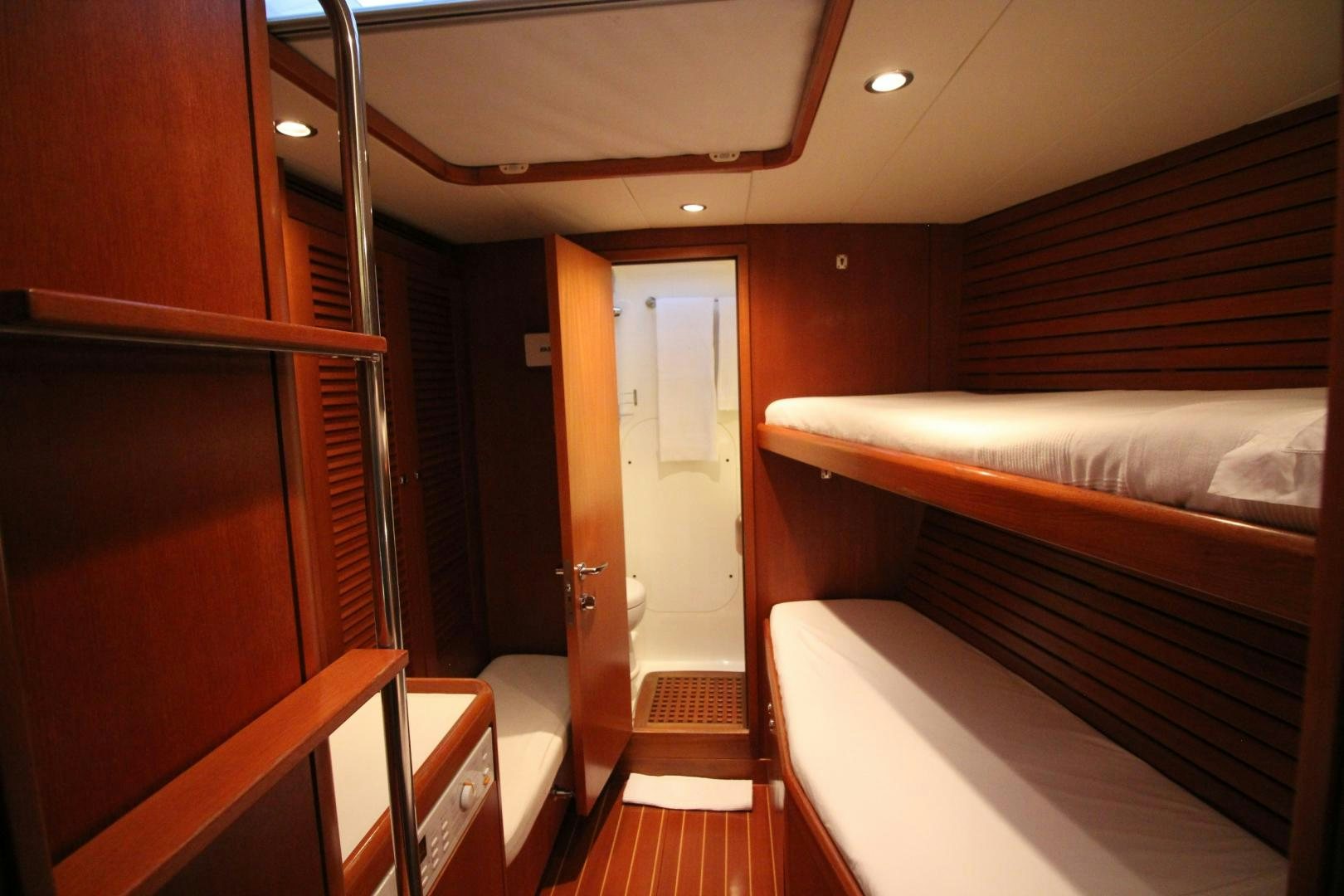 a room with bunk beds aboard kiamar Yacht for Sale