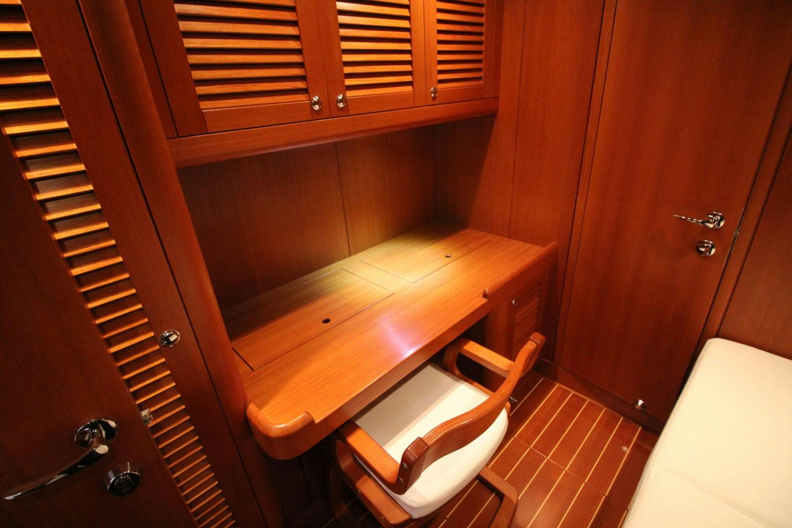 a wooden desk in a room aboard kiamar Yacht for Sale