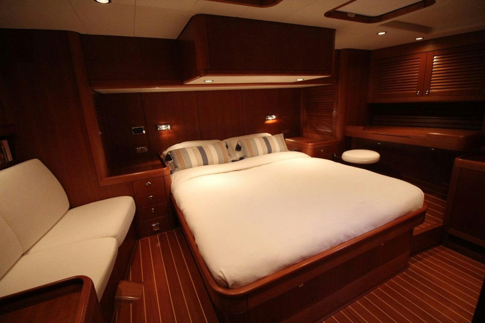 a bed in a room aboard kiamar Yacht for Sale