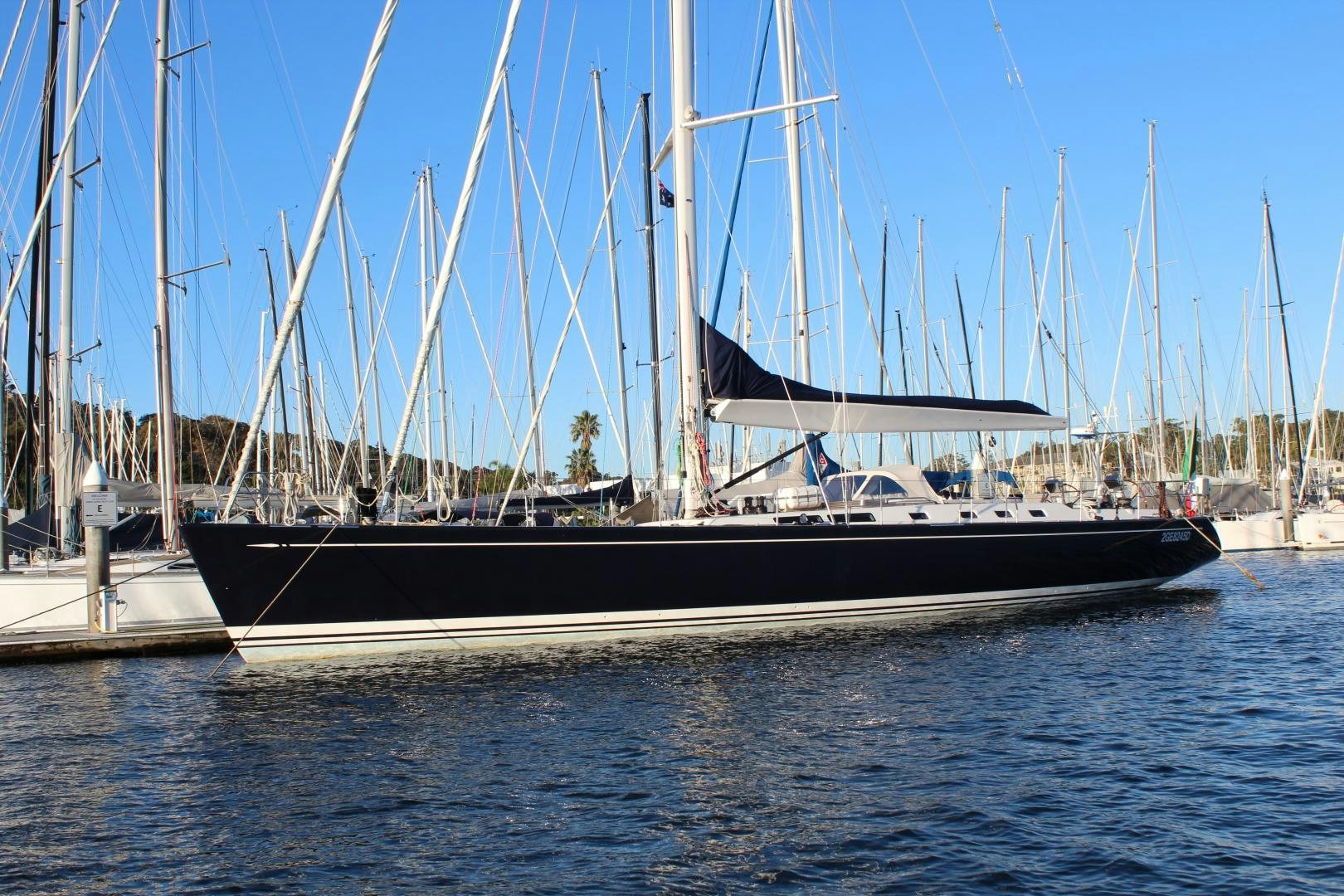 a boat docked at a pier aboard kiamar Yacht for Sale