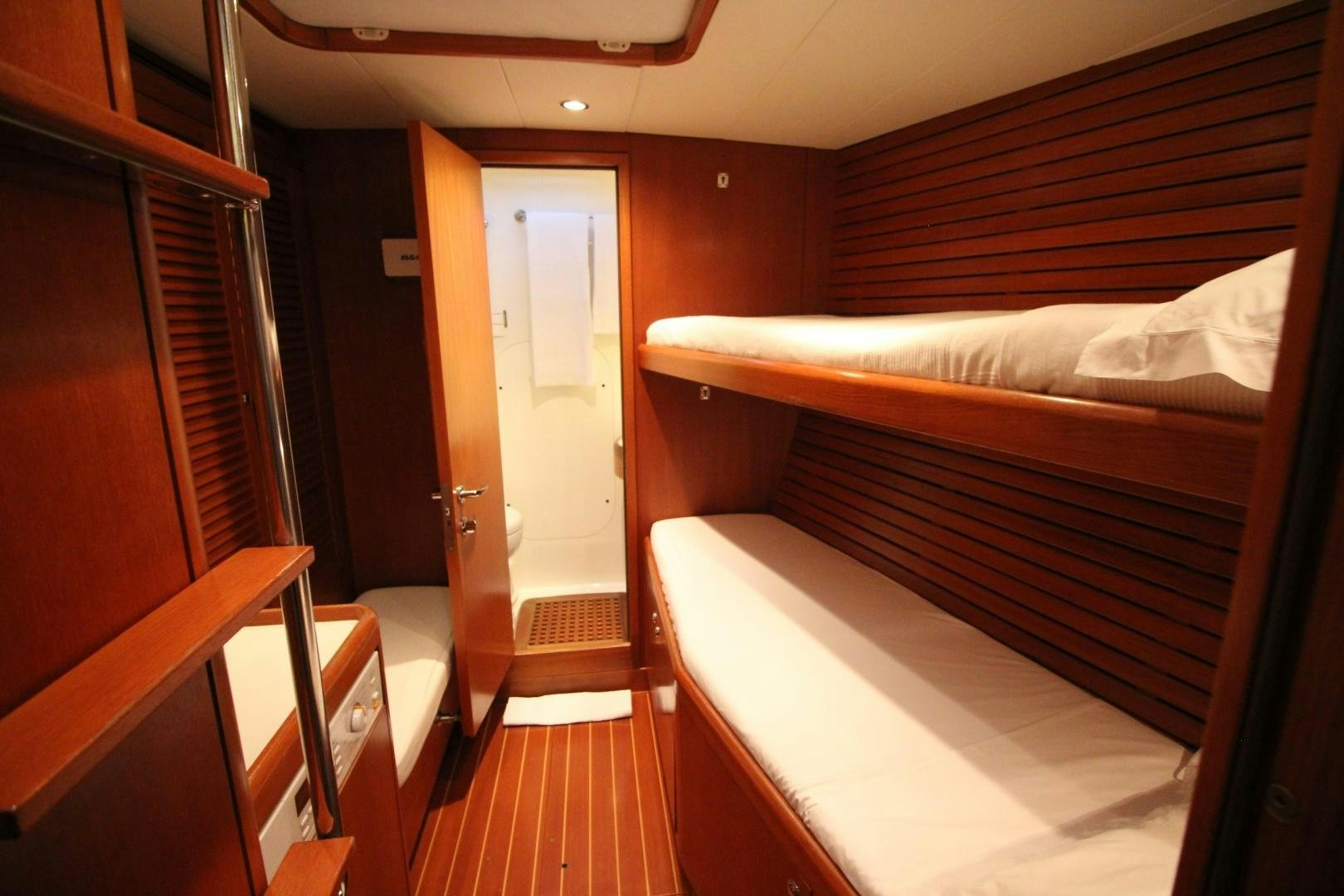 a room with bunk beds aboard kiamar Yacht for Sale