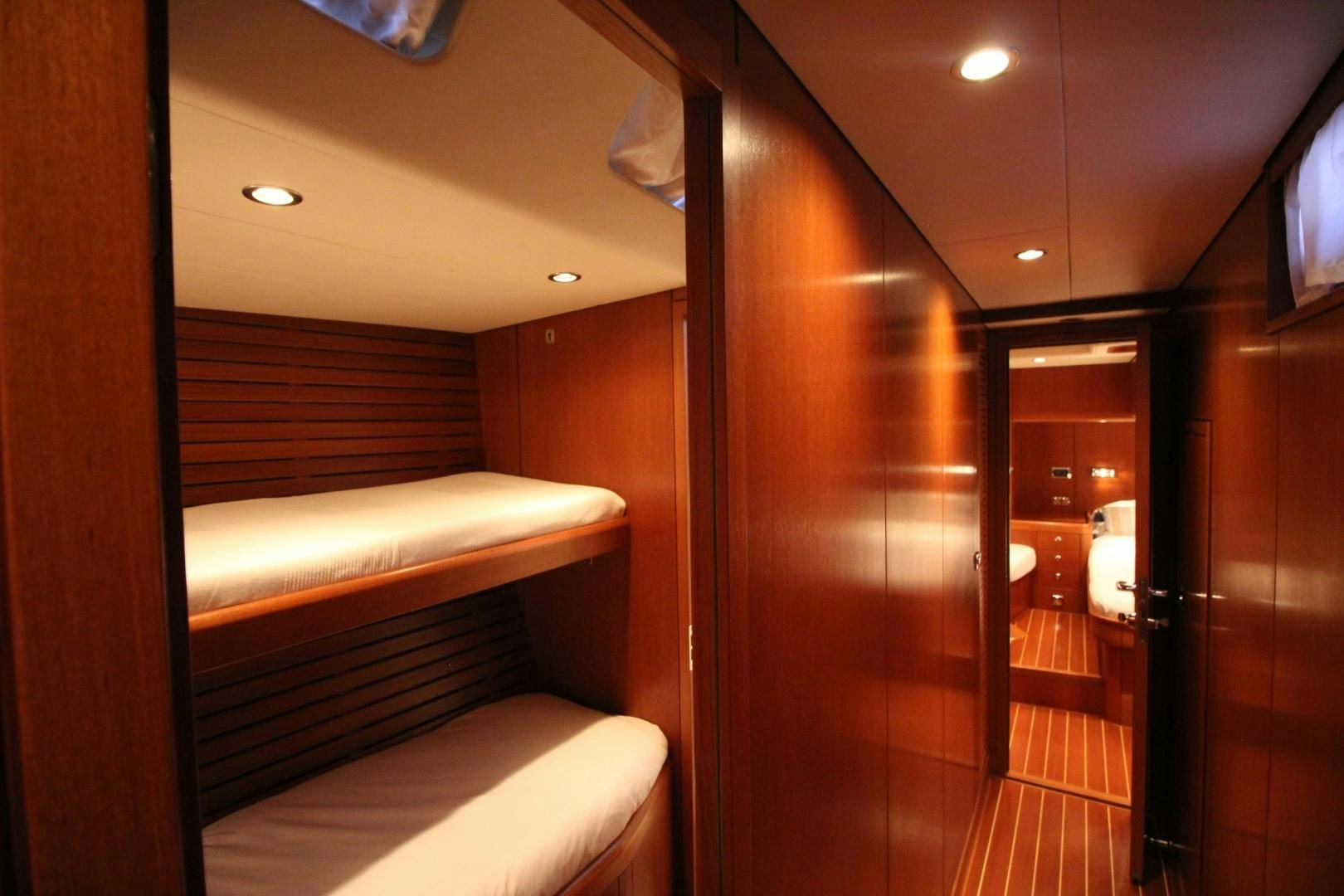 a room with a wood door and a wood door aboard kiamar Yacht for Sale