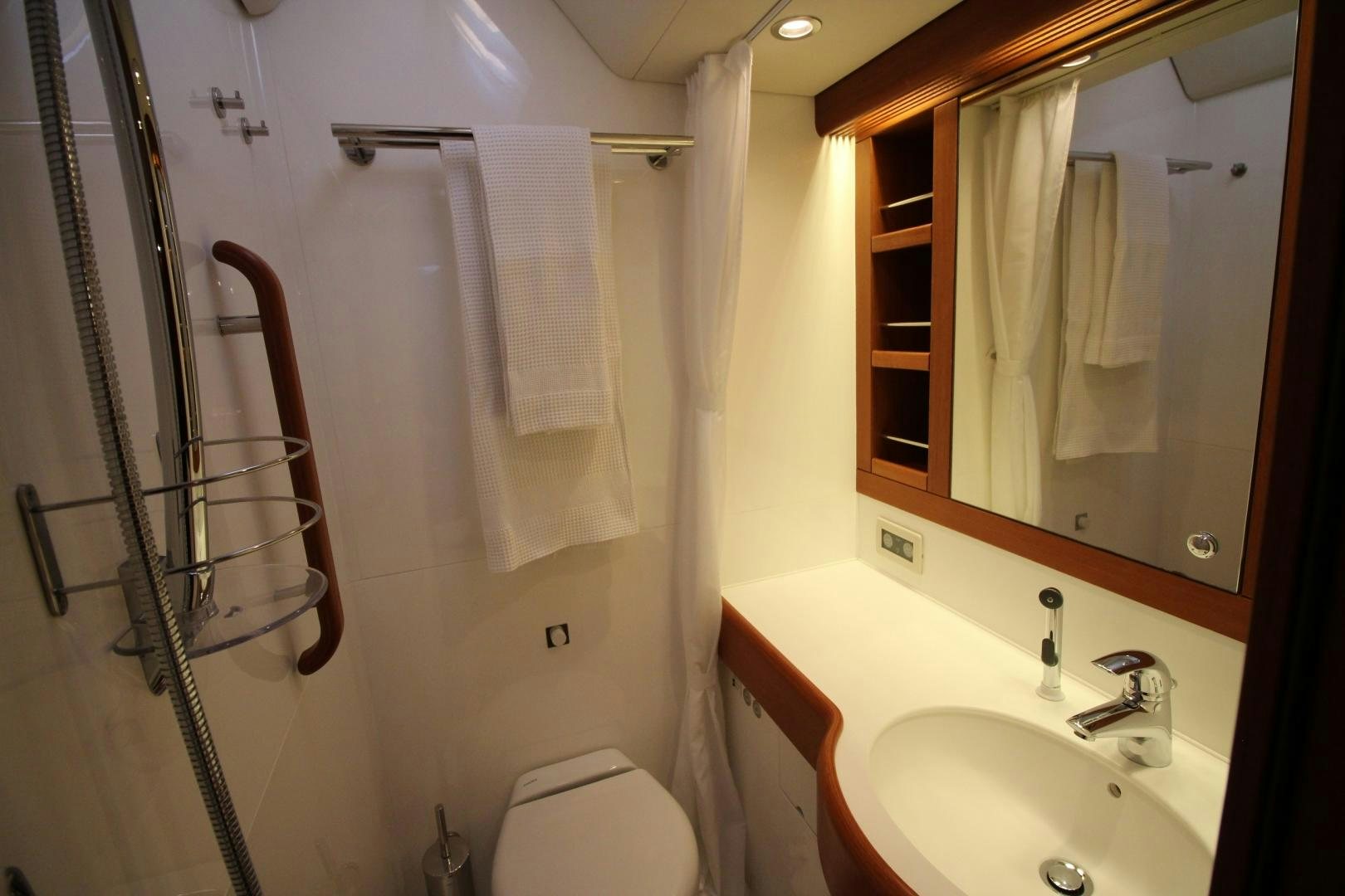 a bathroom with a ladder and toilet aboard kiamar Yacht for Sale