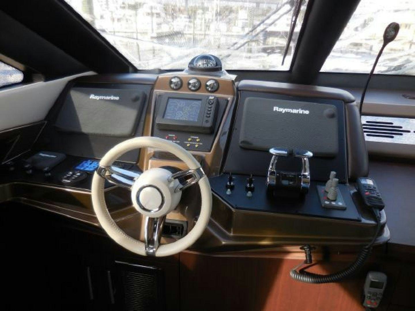 the inside of a car aboard No Name Yacht for Sale