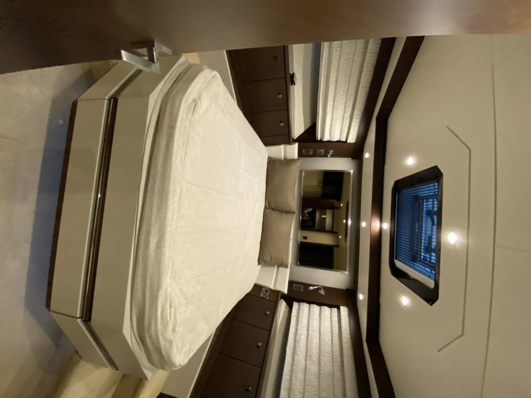 a room with a closet and a mirror aboard No Name Yacht for Sale
