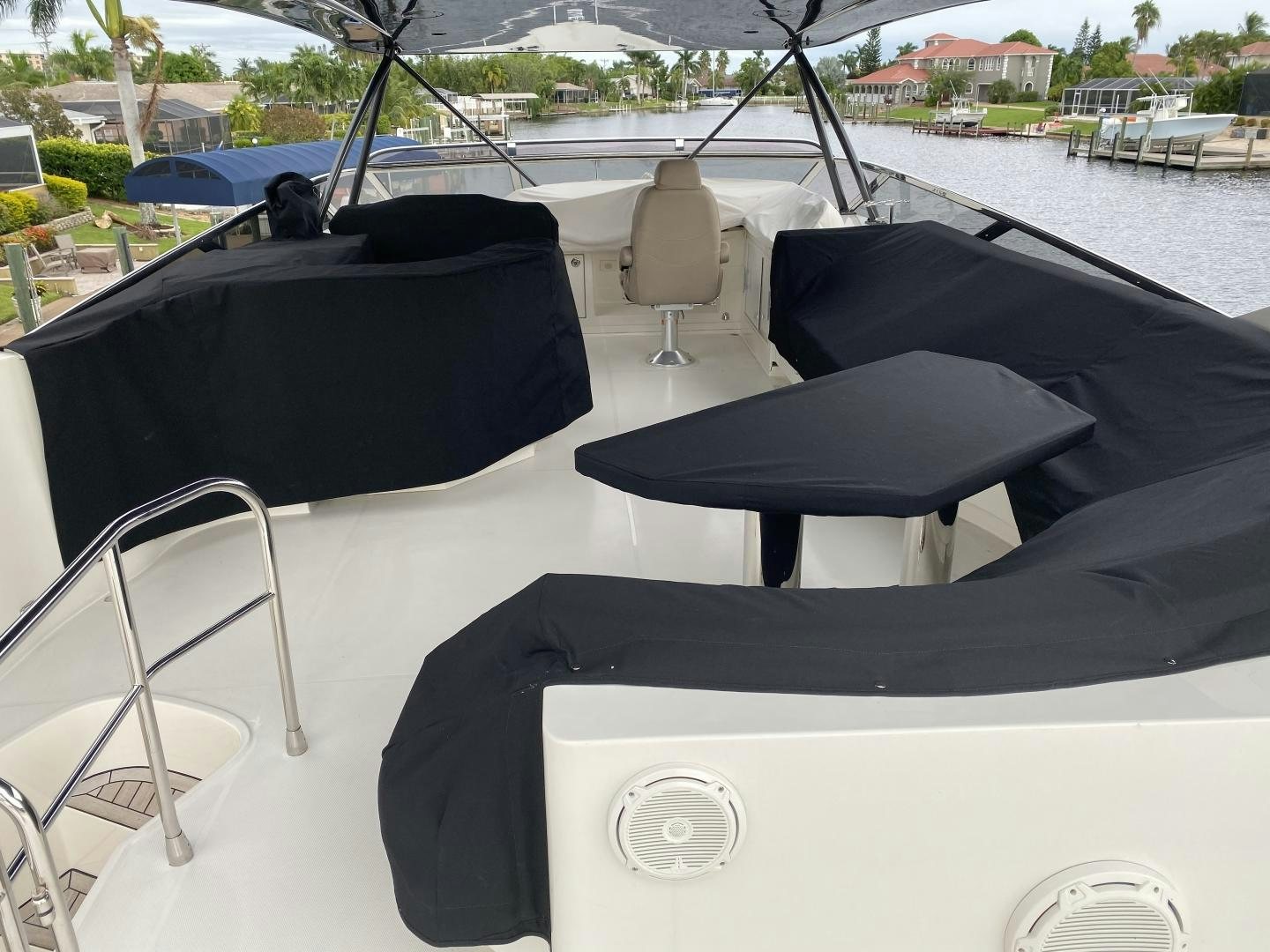 a boat with a black seat aboard No Name Yacht for Sale