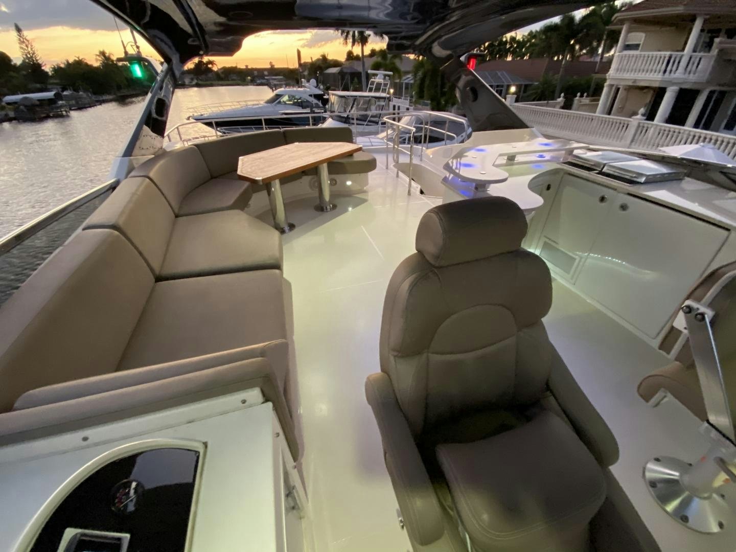 a boat with a table and chairs aboard No Name Yacht for Sale