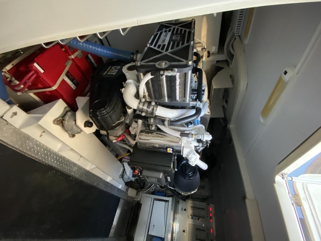 a car with a hood open aboard No Name Yacht for Sale