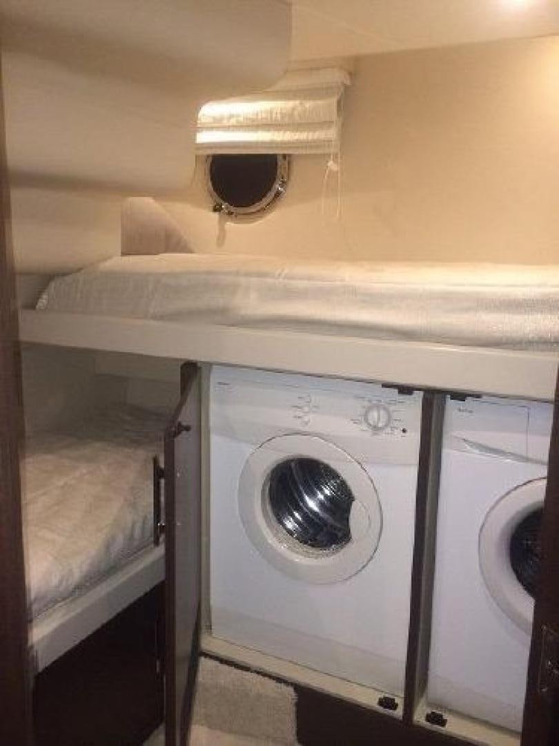 a washing machine in a room aboard No Name Yacht for Sale